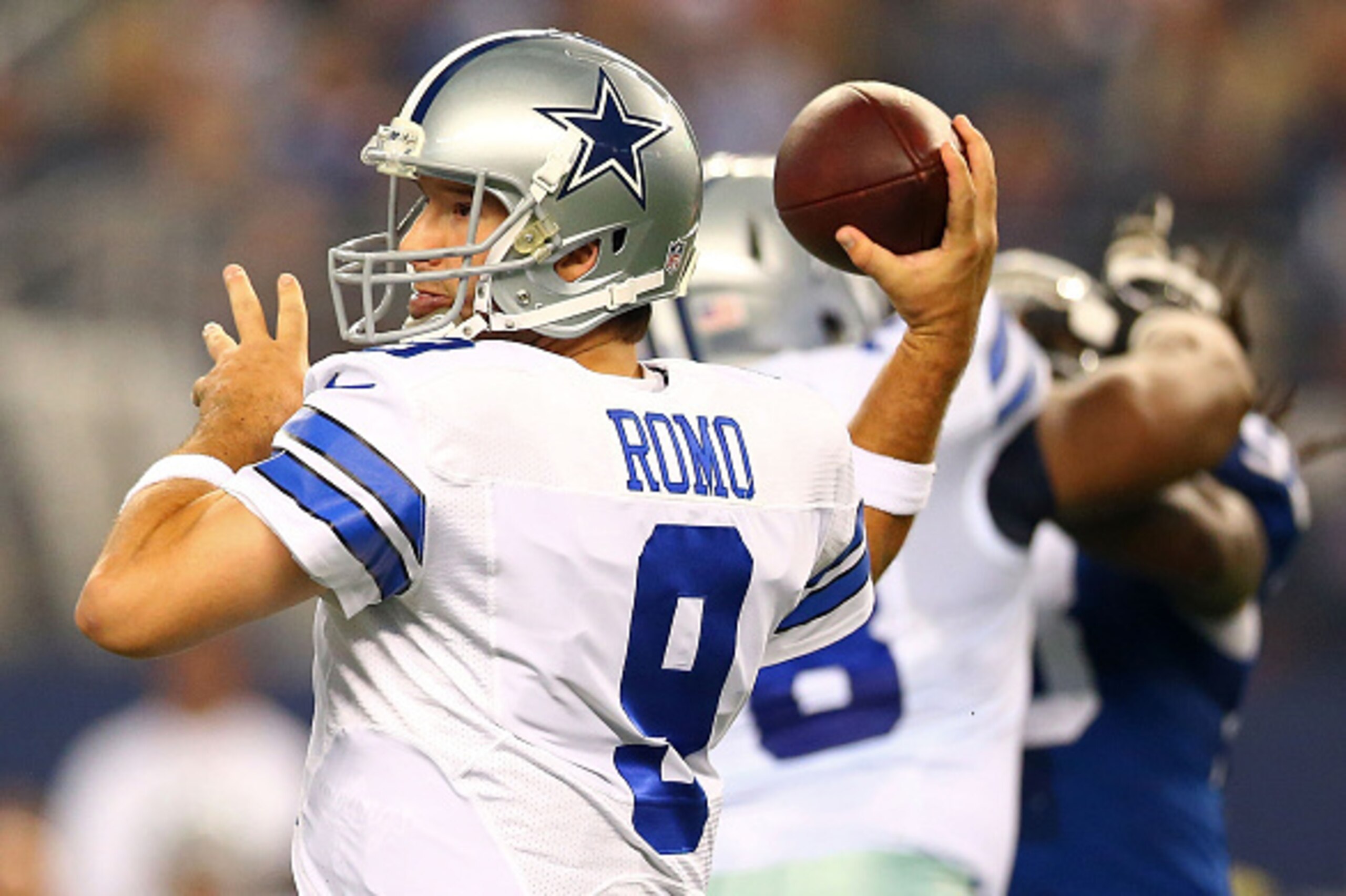 ARLINGTON, TX - DECEMBER 21:  Tony Romo #9 of the Dallas Cowboys passes against the Indianapolis Colts at AT&T Stadium on December 21, 2014 in Arlington, Texas.  (Photo by Ronald Martinez/Getty Images)