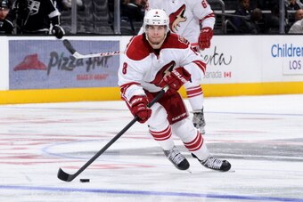 LOS ANGELES, CA - SEPTEMBER 15:  Gilbert Brule #8 of the Phoenix Coyotes skates with the puck against the Los Angeles Kings at Staples Center on September 15, 2013 in Los Angeles, California. (Photo by Noah Graham/NHLI via Getty Images)