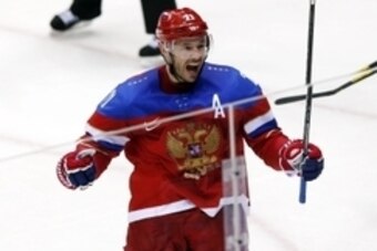 Feb 18, 2014; Sochi, RUSSIA; Russia forward Ilya Kovalchuk (71) celebrates after scoring a goal against Norway in a men's ice hockey playoffs qualifications game during the Sochi 2014 Olympic Winter Games at Bolshoy Ice Dome. Mandatory Credit: Winslow Tow
