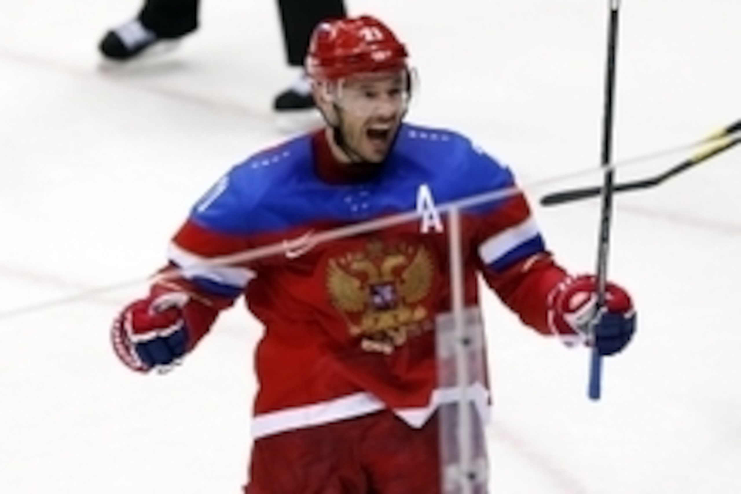Feb 18, 2014; Sochi, RUSSIA; Russia forward Ilya Kovalchuk (71) celebrates after scoring a goal against Norway in a men's ice hockey playoffs qualifications game during the Sochi 2014 Olympic Winter Games at Bolshoy Ice Dome. Mandatory Credit: Winslow Tow