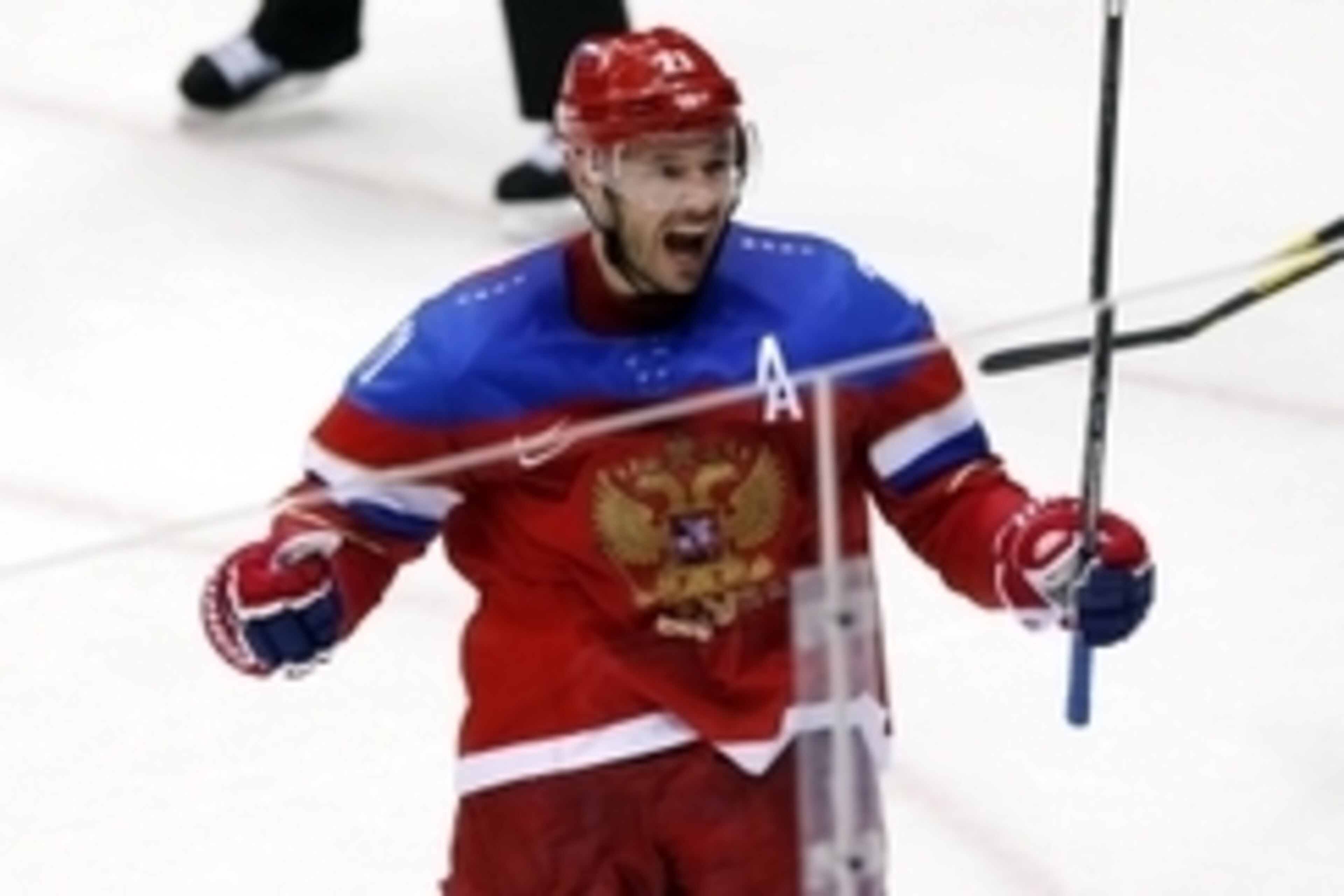 Feb 18, 2014; Sochi, RUSSIA; Russia forward Ilya Kovalchuk (71) celebrates after scoring a goal against Norway in a men's ice hockey playoffs qualifications game during the Sochi 2014 Olympic Winter Games at Bolshoy Ice Dome. Mandatory Credit: Winslow Tow