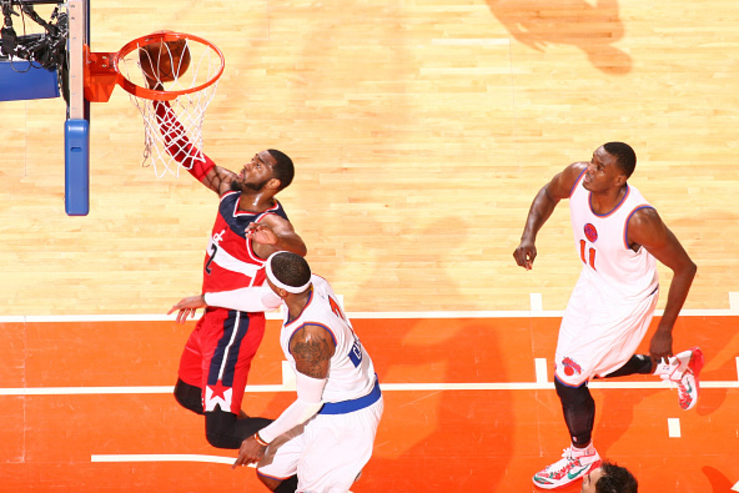 NEW YORK, NY - DECEMBER 25: John Wall #2 of the Washington Wizards shoots during a game against the New York Knicks at Madison Square Garden on December 25, 2014 in New York, New York. NOTE TO USER: User expressly acknowledges and agrees that, by download