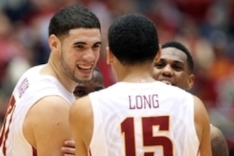 Dec 4, 2014; Ames, IA, USA; Iowa State Cyclones forward Georges Niang (31), guard Monte Morris (11) and guard Naz Long (15) react during a timeout against the Arkansas Razorbacks at James H. Hilton Coliseum. Iowa State beat Arkansas 95-77.  Mandatory Cred