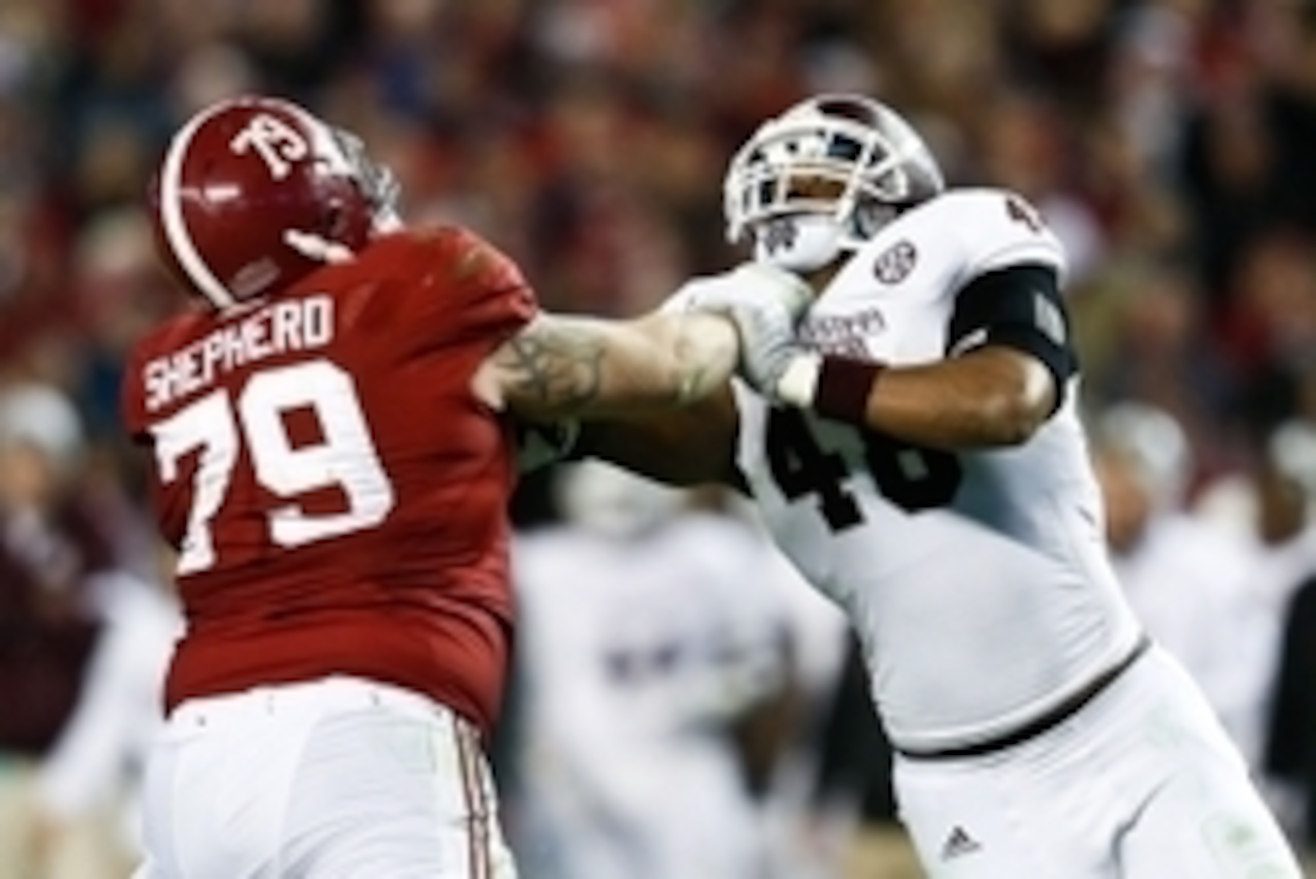 Nov 15, 2014; Tuscaloosa, AL, USA; Alabama Crimson Tide offensive lineman Austin Shepherd (79) blocks Mississippi State Bulldogs defensive lineman Ryan Brown (48) at Bryant-Denny Stadium. Mandatory Credit: Marvin Gentry-USA TODAY Sports