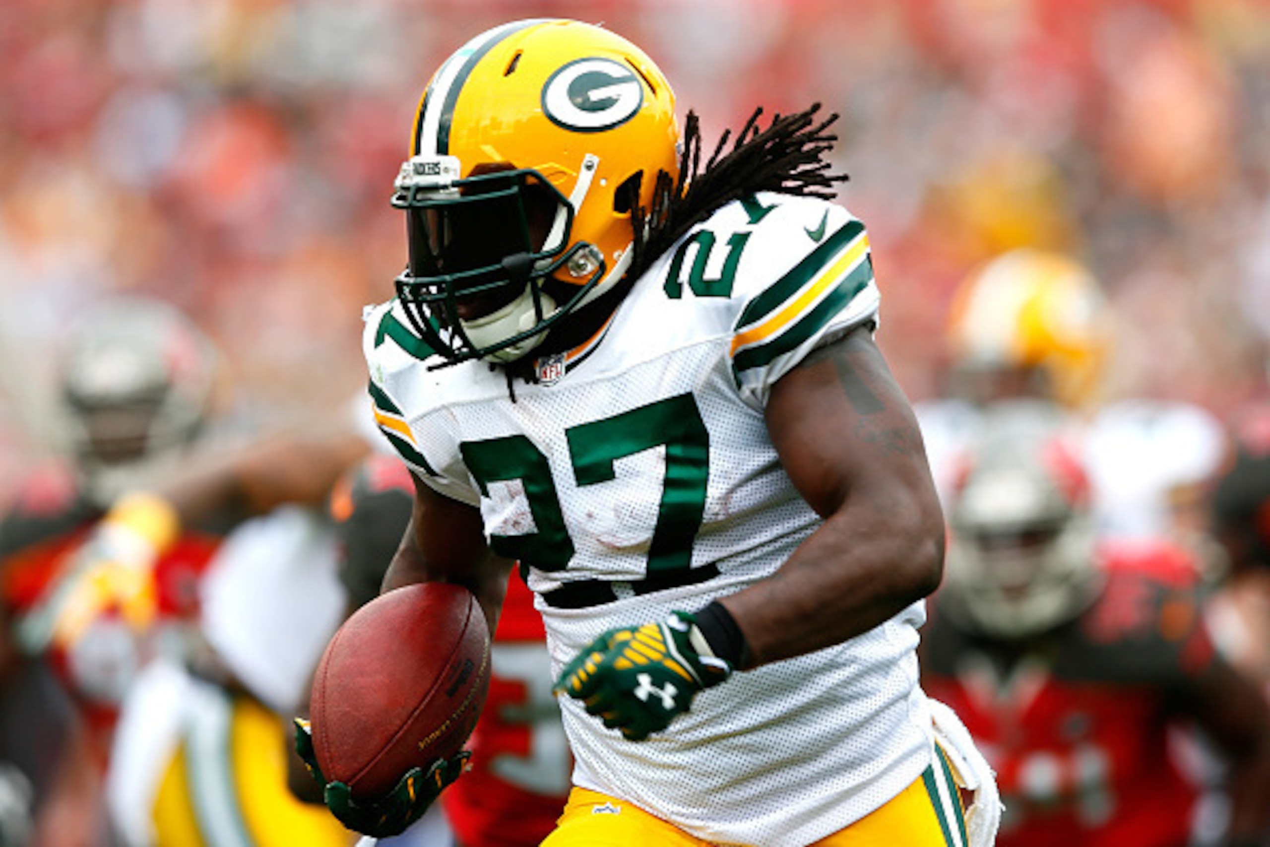 TAMPA, FL - DECEMBER 21:  Eddie Lacy #27 of the Green Bay Packers rushes for a touchdown against the Tampa Bay Buccaneers at Raymond James Stadium on December 21, 2014 in Tampa, Florida.  (Photo by Kevin C. Cox/Getty Images)