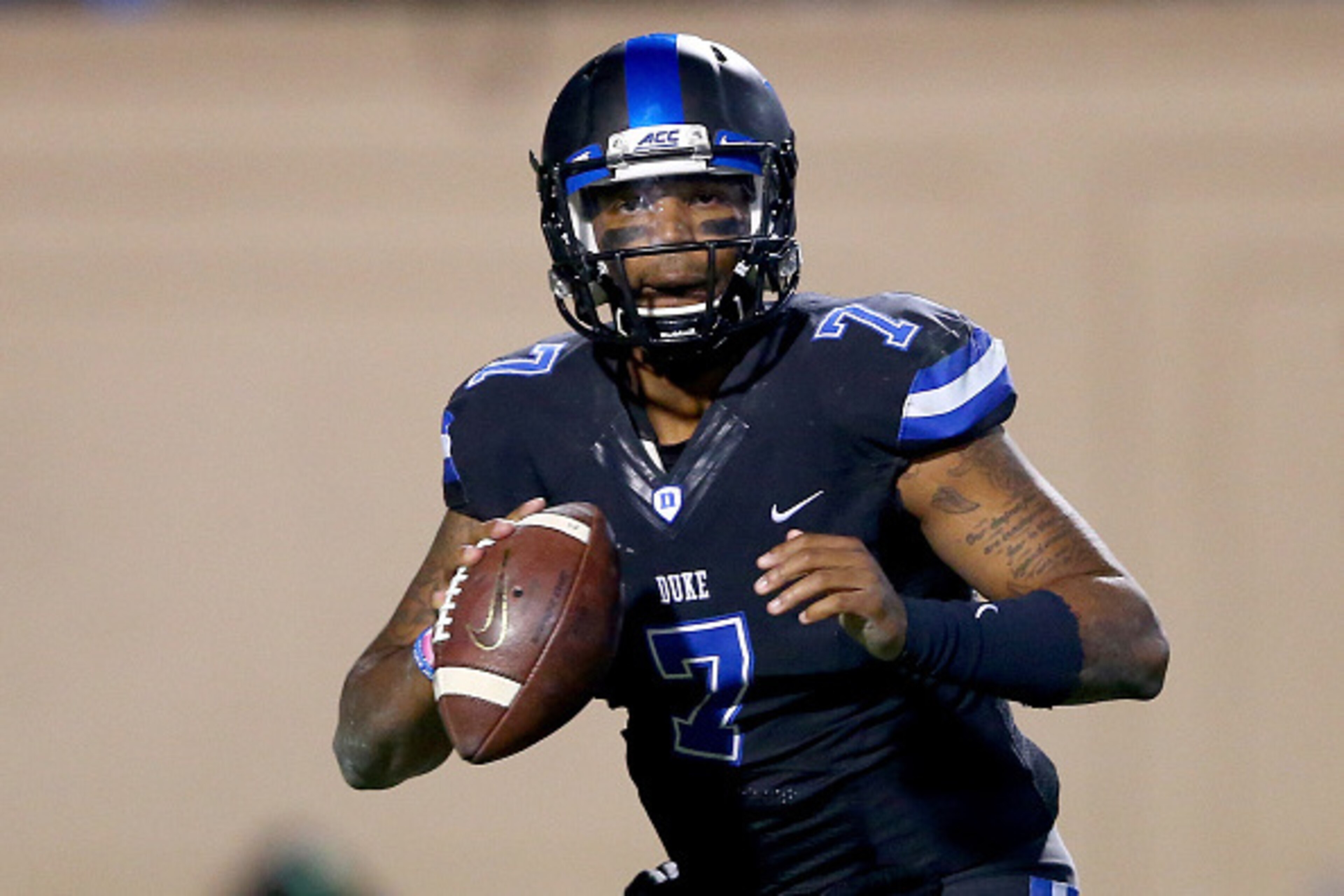 DURHAM, NC - NOVEMBER 20:  Anthony Boone #7 of the Duke Blue Devils runs with the ball against the North Carolina Tar Heels during their game at Wallace Wade Stadium on November 20, 2014 in Durham, North Carolina.  (Photo by Streeter Lecka/Getty Images)