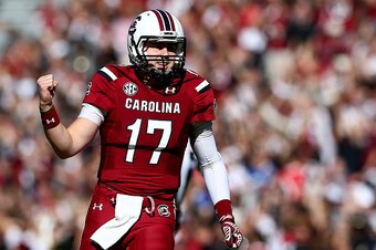 COLUMBIA, SC - NOVEMBER 22:  Dylan Thompson #17 of the South Carolina Gamecocks celebrates after throwing a touchdown pass against the South Alabama Jaguars during their game at Williams-Brice Stadium on November 22, 2014 in Columbia, South Carolina.  (Ph