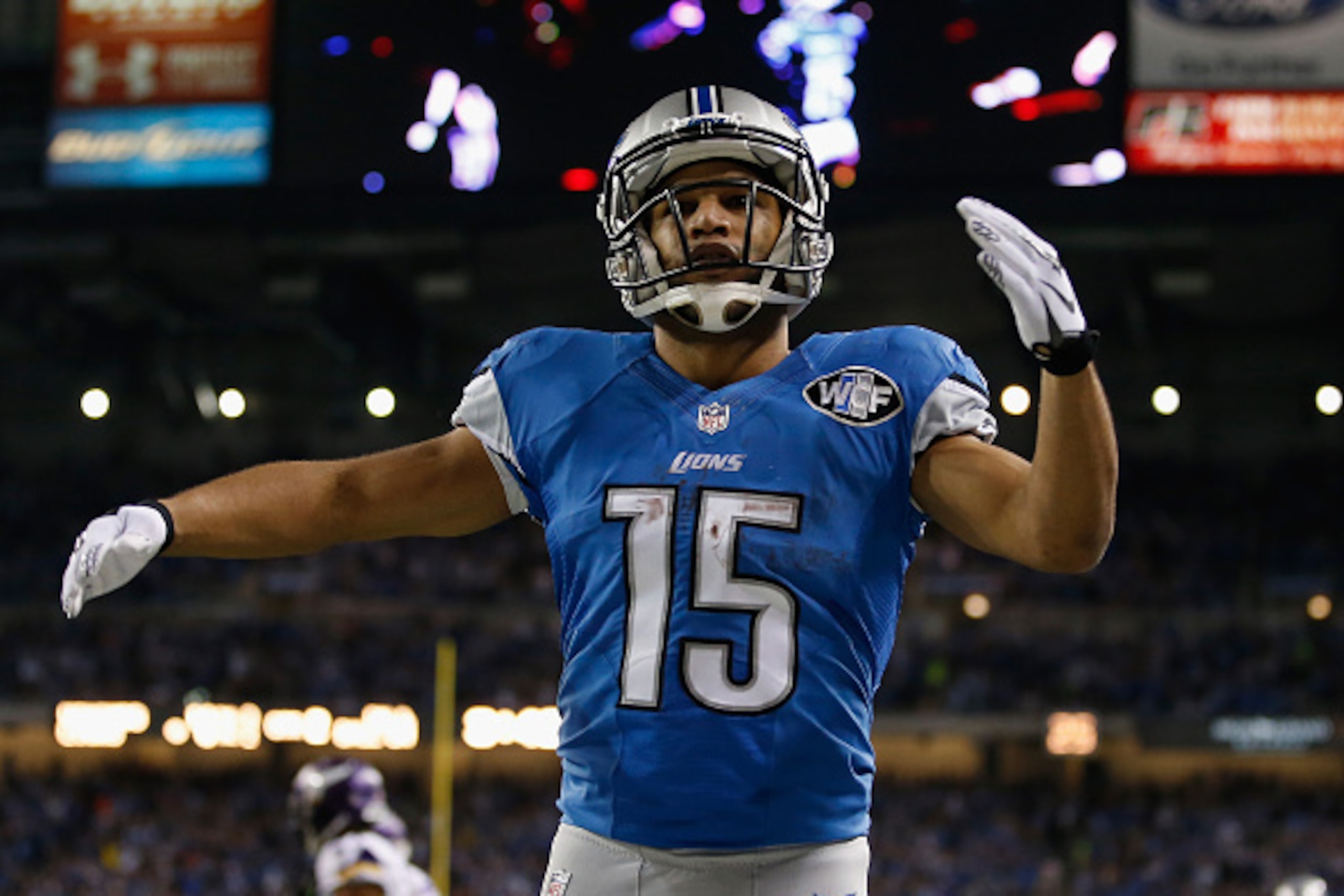DETROIT, MI - DECEMBER 14: Golden Tate #15 of the Detroit Lions celebrates a second quarter touchdown while playing the Minnesota Vikings at Ford Field on December 14, 2014 in Detroit, Michigan. (Photo by Gregory Shamus/Getty Images)