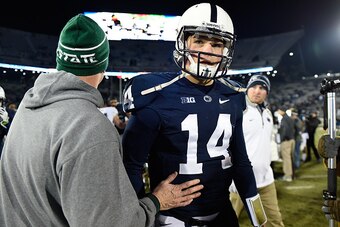 STATE COLLEGE, PA - NOVEMBER 29:  Christian Hackenberg #14 of the Penn State Nittany Lions walks off the field after Michigan State's 34-10 win at Beaver Stadium on November 29, 2014 in State College, Pennsylvania.  (Photo by Joe Sargent/Getty Images)