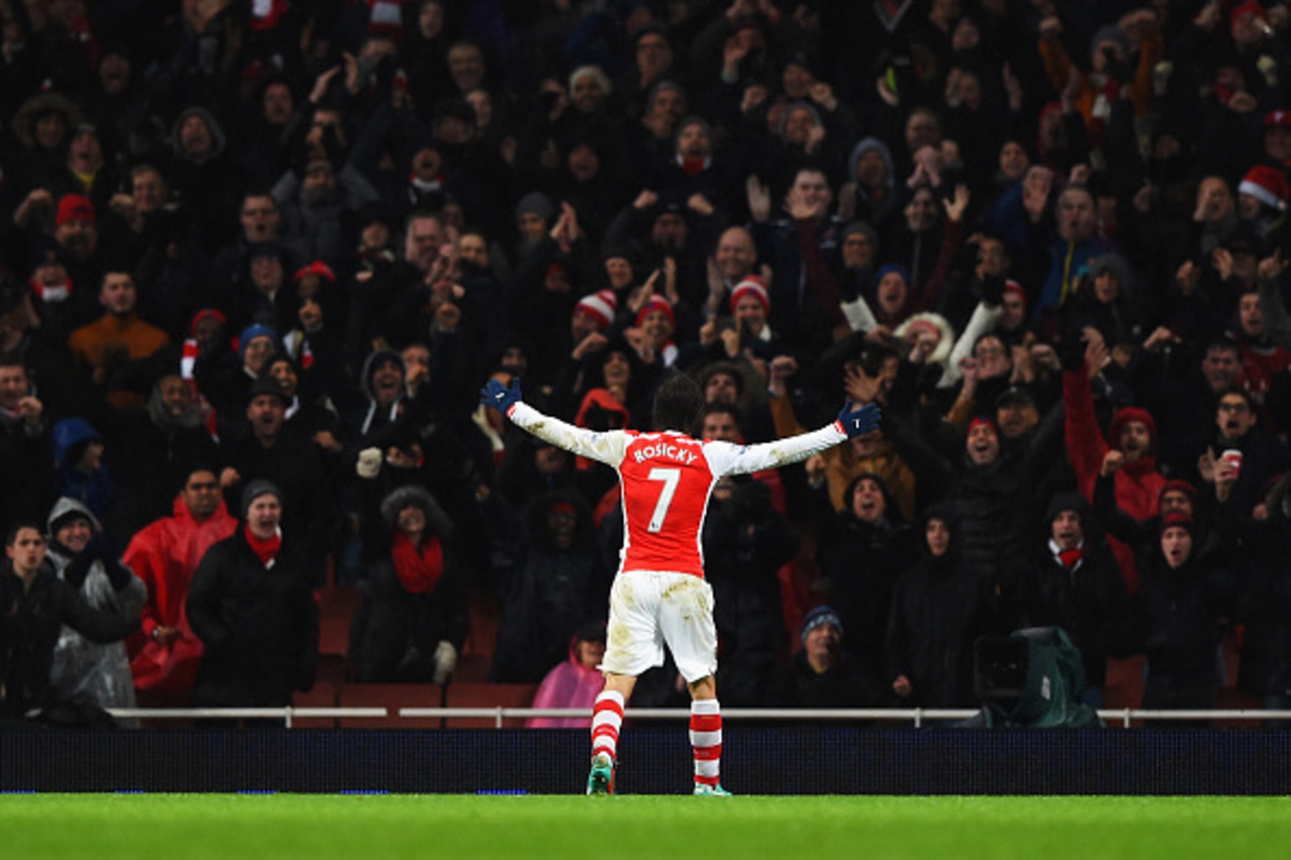 LONDON, ENGLAND - DECEMBER 26:  Tomas Rosicky of Arsenal celebrates scoring his team's second goal during the Barclays Premier League match between Arsenal and Queens Park Rangers at Emirates Stadium on December 26, 2014 in London, England.  (Photo by Sha