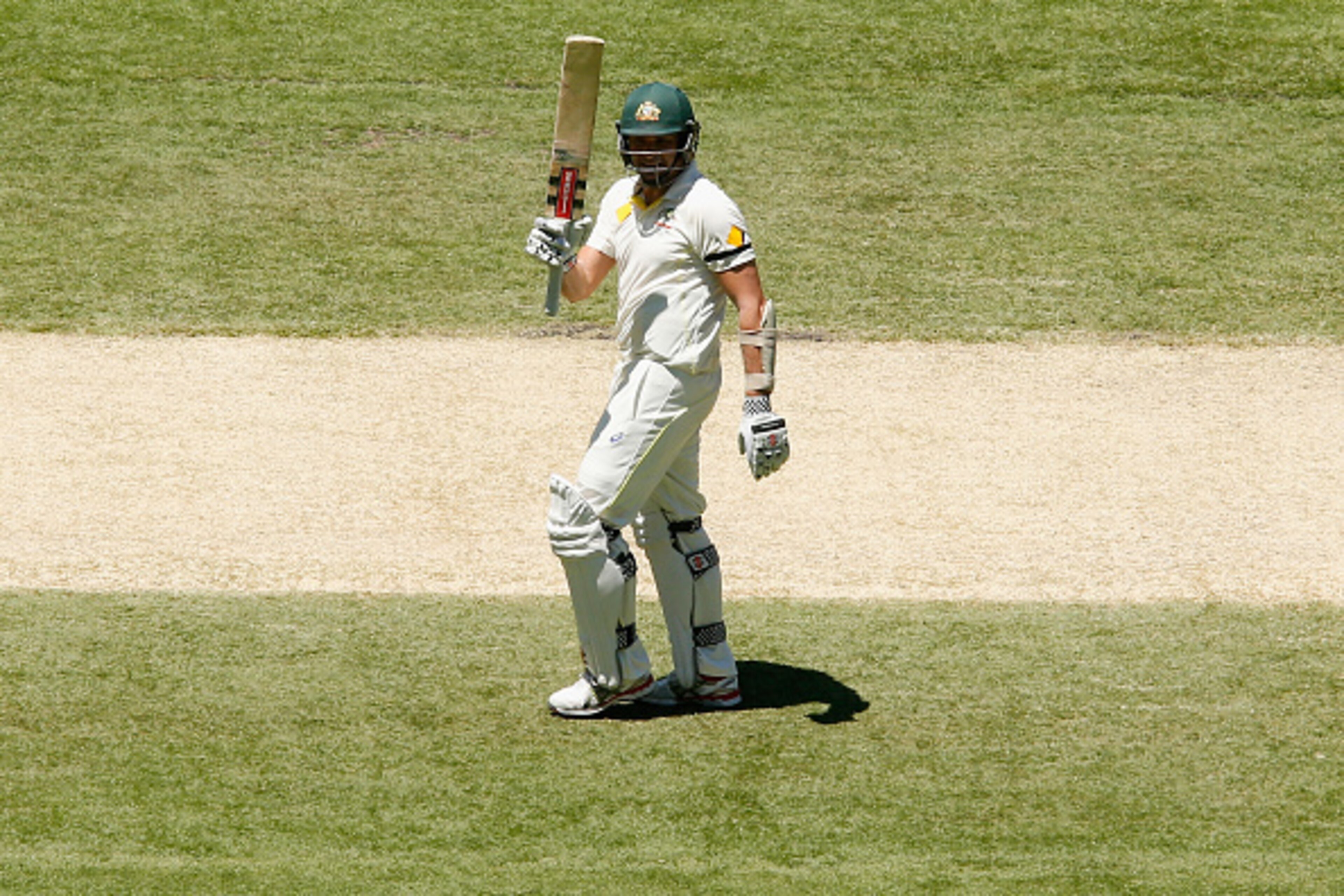 MELBOURNE, AUSTRALIA - DECEMBER 27:  Ryan Harris of Australia raises his bat after scoring 50 runs during day two of the Third Test match between Australia and India at Melbourne Cricket Ground on December 27, 2014 in Melbourne, Australia.  (Photo by Darr