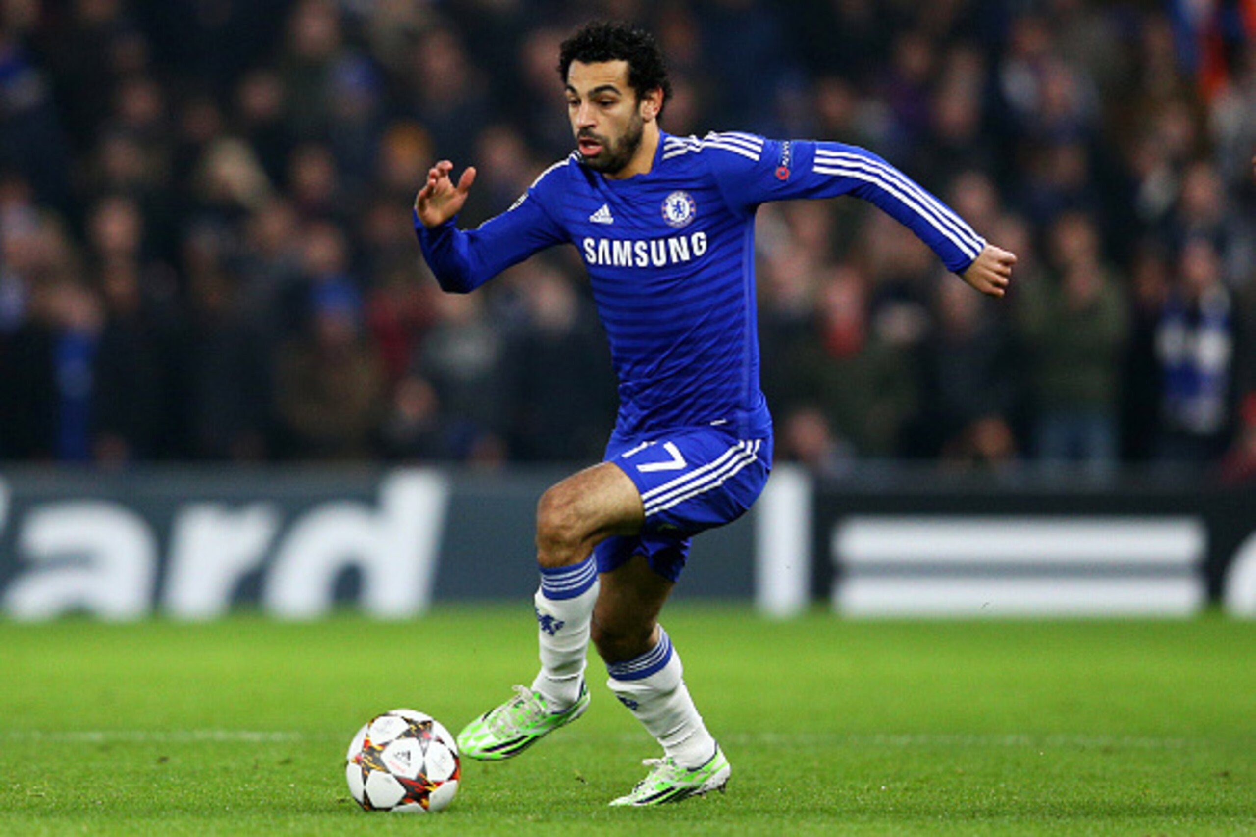 LONDON, ENGLAND - DECEMBER 10:  Mohamed Salah of Chelsea runs with the ball during the UEFA Champions League group G match between Chelsea and Sporting Clube de Portugal at Stamford Bridge on December 10, 2014 in London, United Kingdom.  (Photo by Clive M