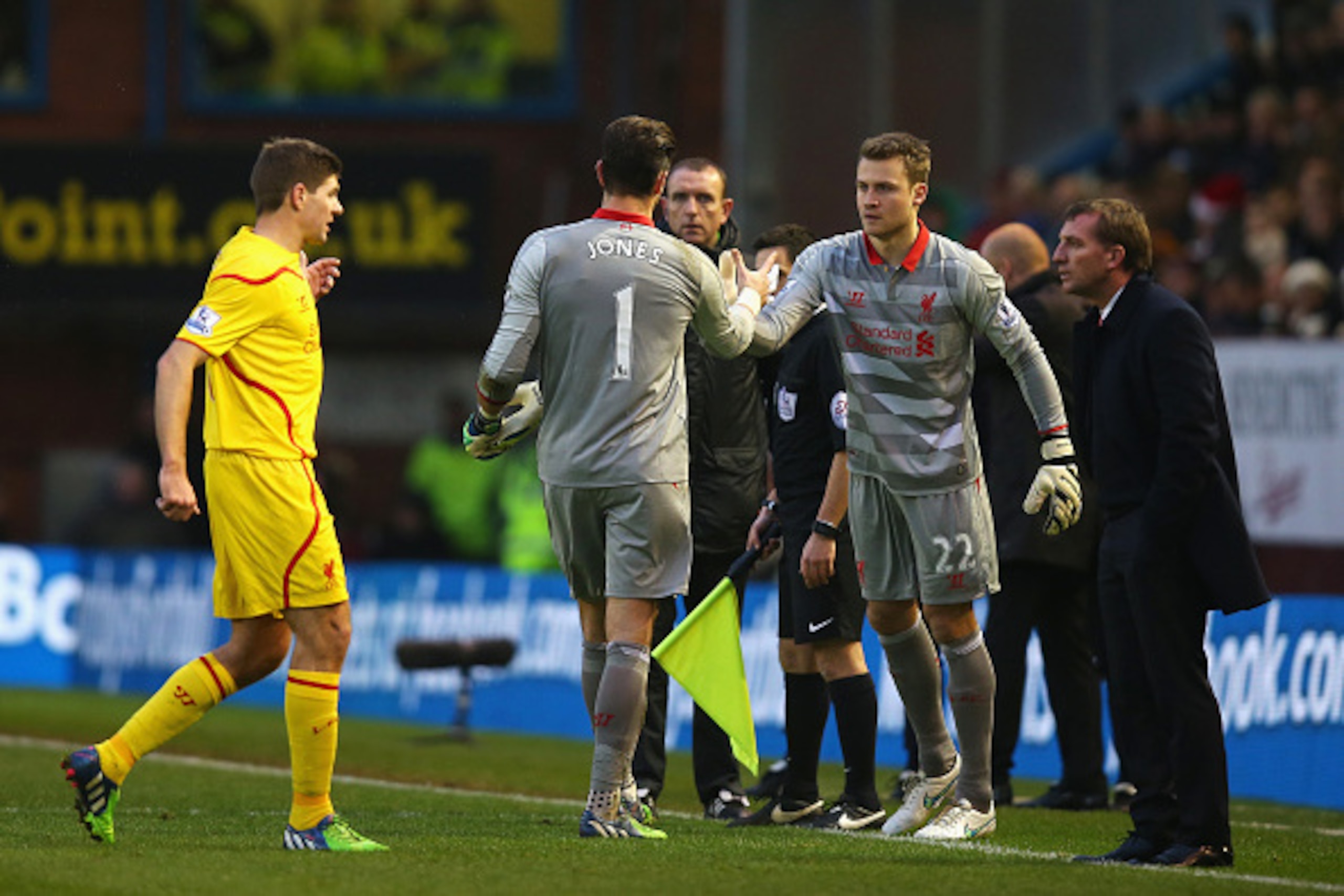 BURNLEY, ENGLAND - DECEMBER 26: Goalkeeper Brad Jones of Liverpool is replaced by Simon Mignolet of Liverpool as Steven Gerrard talks to Brendan Rodgers, manager of Liverpool during the Barclays Premier League match between Burnley and Liverpool at Turf M