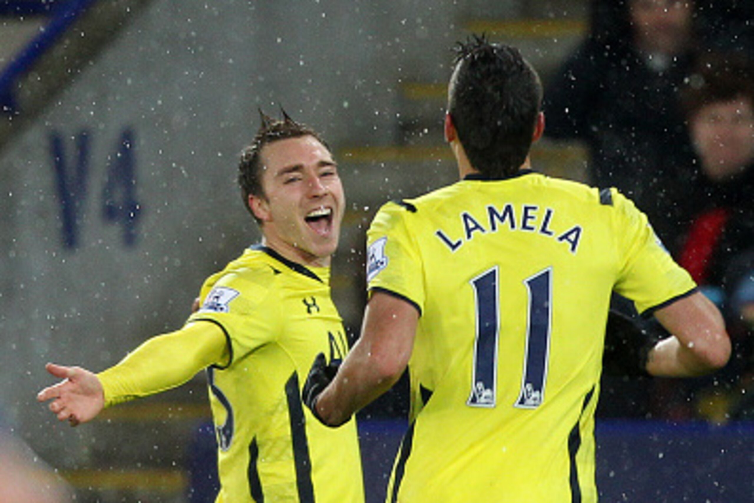 LEICESTER, ENGLAND - DECEMBER 26:  Christian Eriksen of Spurs celebrates with team-mate Erik Lamela after scoring his team's second goal during the Barclays Premier League match between Leicester City and Tottenham Hotspur at The King Power Stadium on Dec