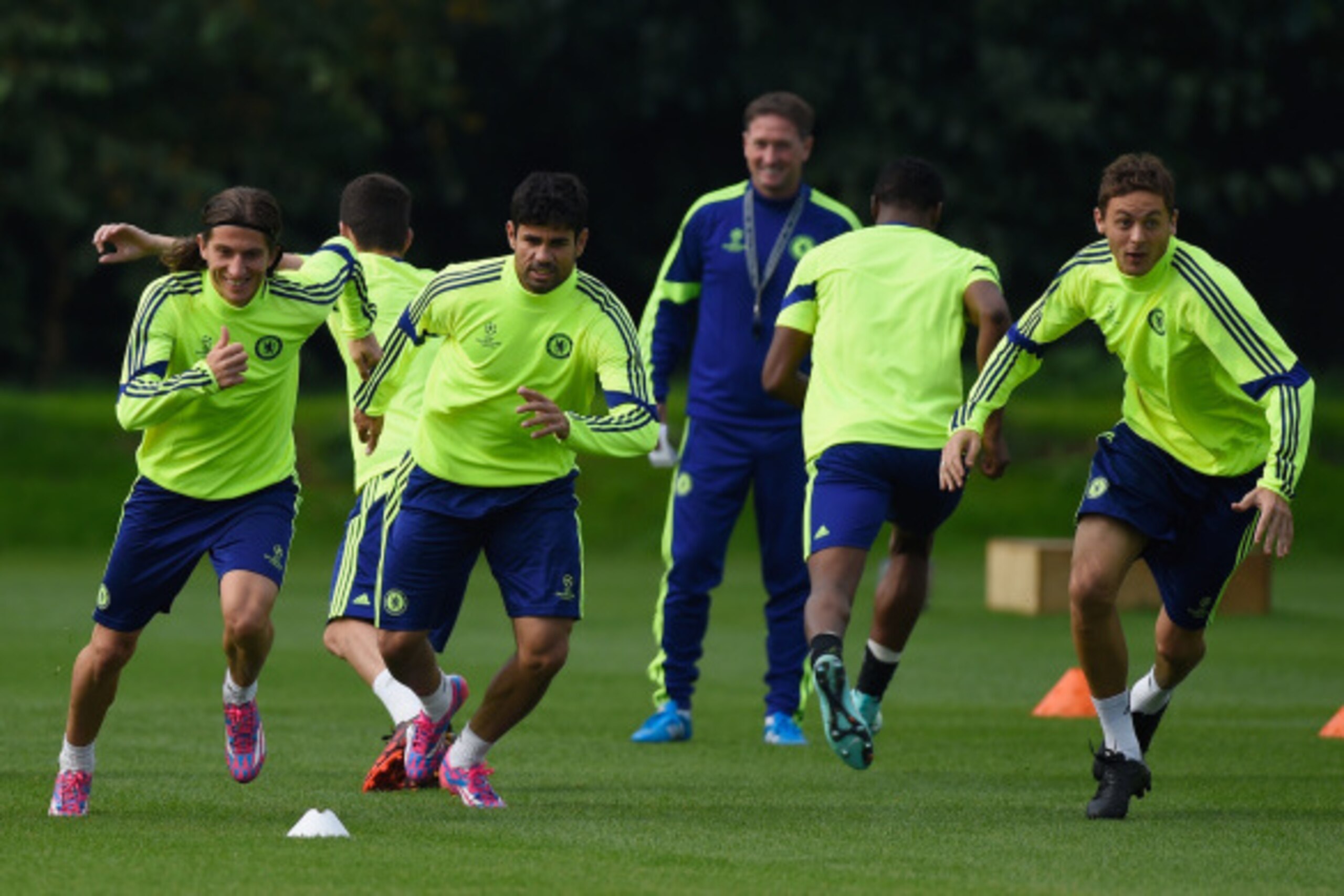COBHAM, ENGLAND - SEPTEMBER 16:  Filipe Luis, Diego Costa and Nemanja Matic of Chelsea in action during a Chelsea training session at the Chelsea training ground on September 16, 2014 in Cobham, United Kingdom.  (Photo by Mike Hewitt/Getty Images)
