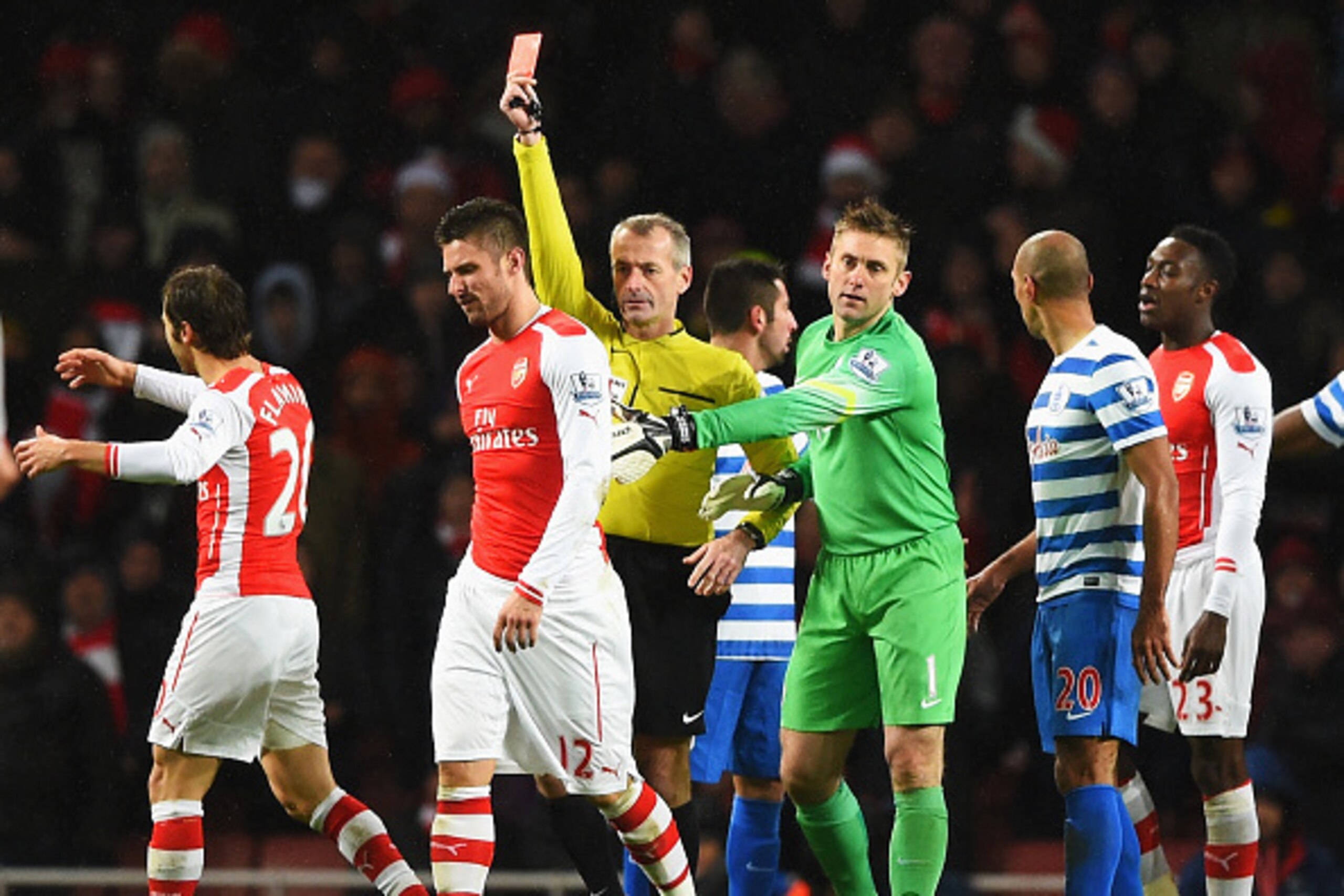 LONDON, ENGLAND - DECEMBER 26:  Olivier Giroud of Arsenal is sent off for a head butt on Nedum Onuoha of QPR by referee Martin Atkinson during the Barclays Premier League match between Arsenal and Queens Park Rangers at Emirates Stadium on December 26, 20