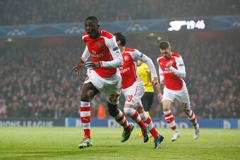 LONDON, ENGLAND - NOVEMBER 26:  Yaya Sanogo of Arsenal celebrates after scoring the opening goal during the UEFA Champions League Group D match between Arsenal and Borussia Dortmund at the Emirates Stadium on November 26, 2014 in London, United Kingdom.  
