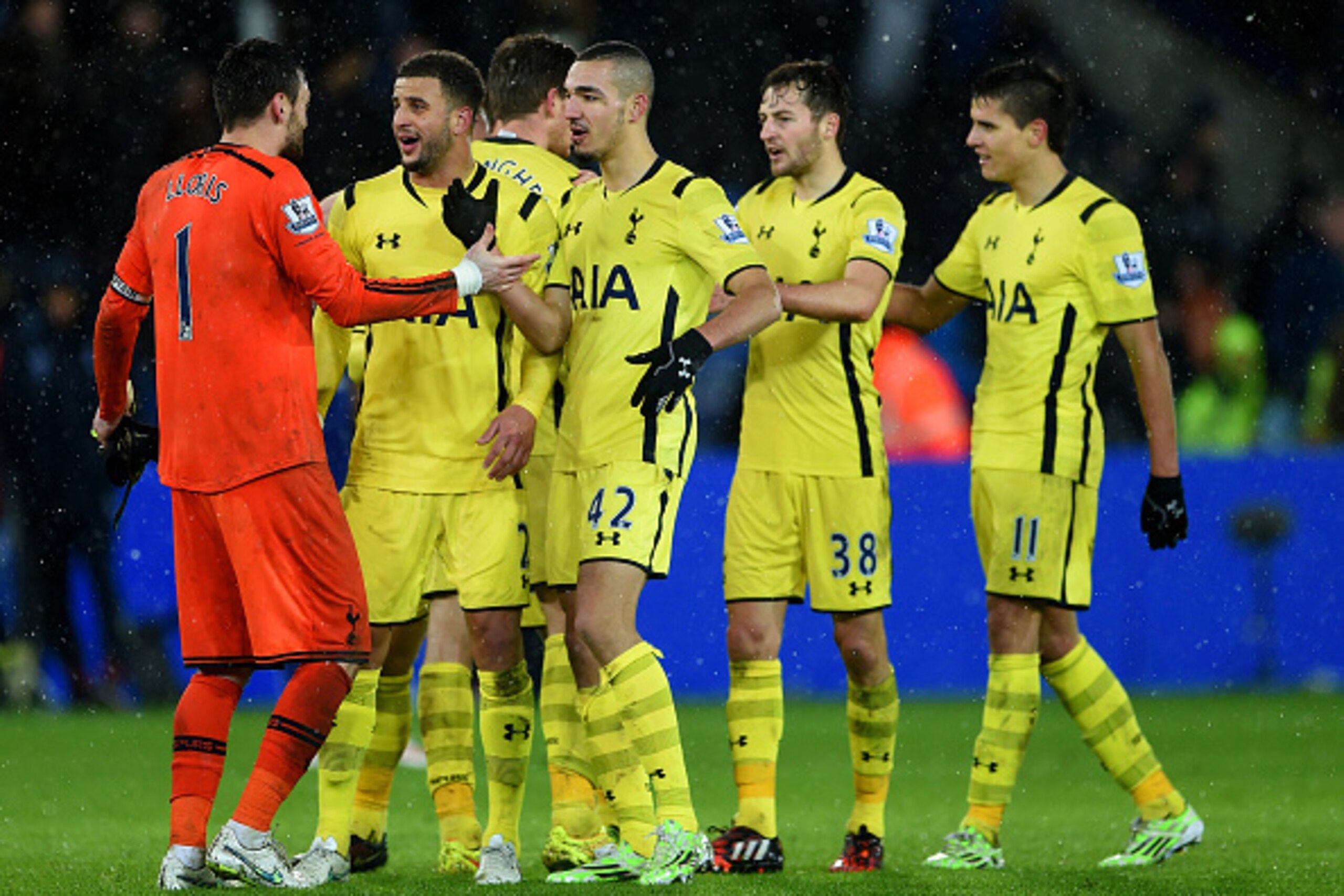 LEICESTER, ENGLAND - DECEMBER 26:  Hugo Lloris of Spurs celebrates with team-mates Kyle Walker and Nabil Bentaleb of Spurs after the Barclays Premier League match between Leicester City and Tottenham Hotspur at The King Power Stadium on December 26, 2014 