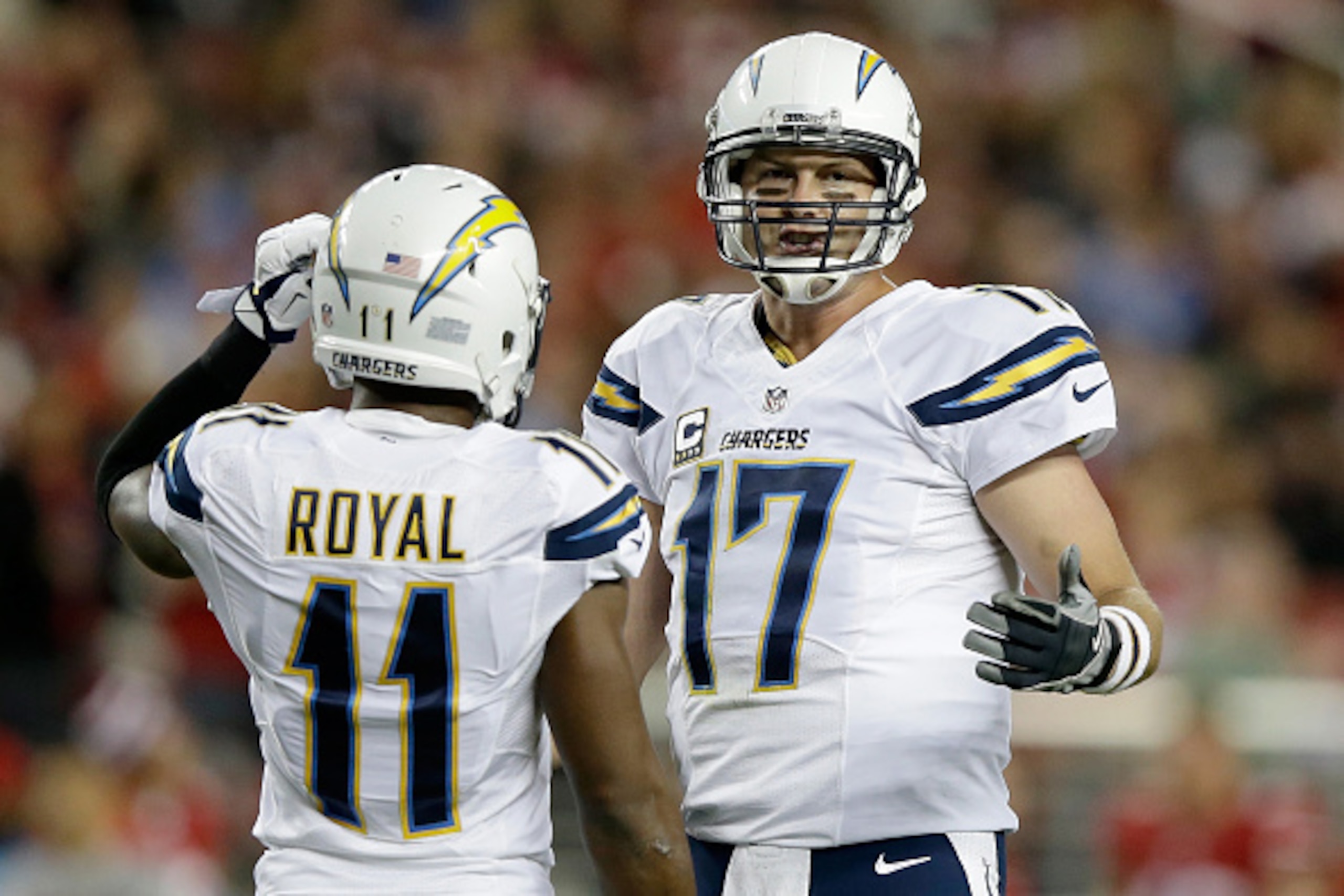 SANTA CLARA, CA - DECEMBER 20:  Quarterback Philip Rivers #17 of the San Diego Chargers talks with wide receiver Eddie Royal #11 in the first half against the San Francisco 49ers at Levi's Stadium on December 20, 2014 in Santa Clara, California.  (Photo b