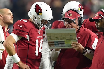 GLENDALE, AZ - DECEMBER 21:  Head coach Bruce Arians of the Arizona Cardinals talks with quarterback Ryan Lindley #14 in the first half of the NFL game against the Seattle Seahawks at University of Phoenix Stadium on December 21, 2014 in Glendale, Arizona
