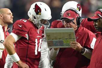 GLENDALE, AZ - DECEMBER 21:  Head coach Bruce Arians of the Arizona Cardinals talks with quarterback Ryan Lindley #14 in the first half of the NFL game against the Seattle Seahawks at University of Phoenix Stadium on December 21, 2014 in Glendale, Arizona