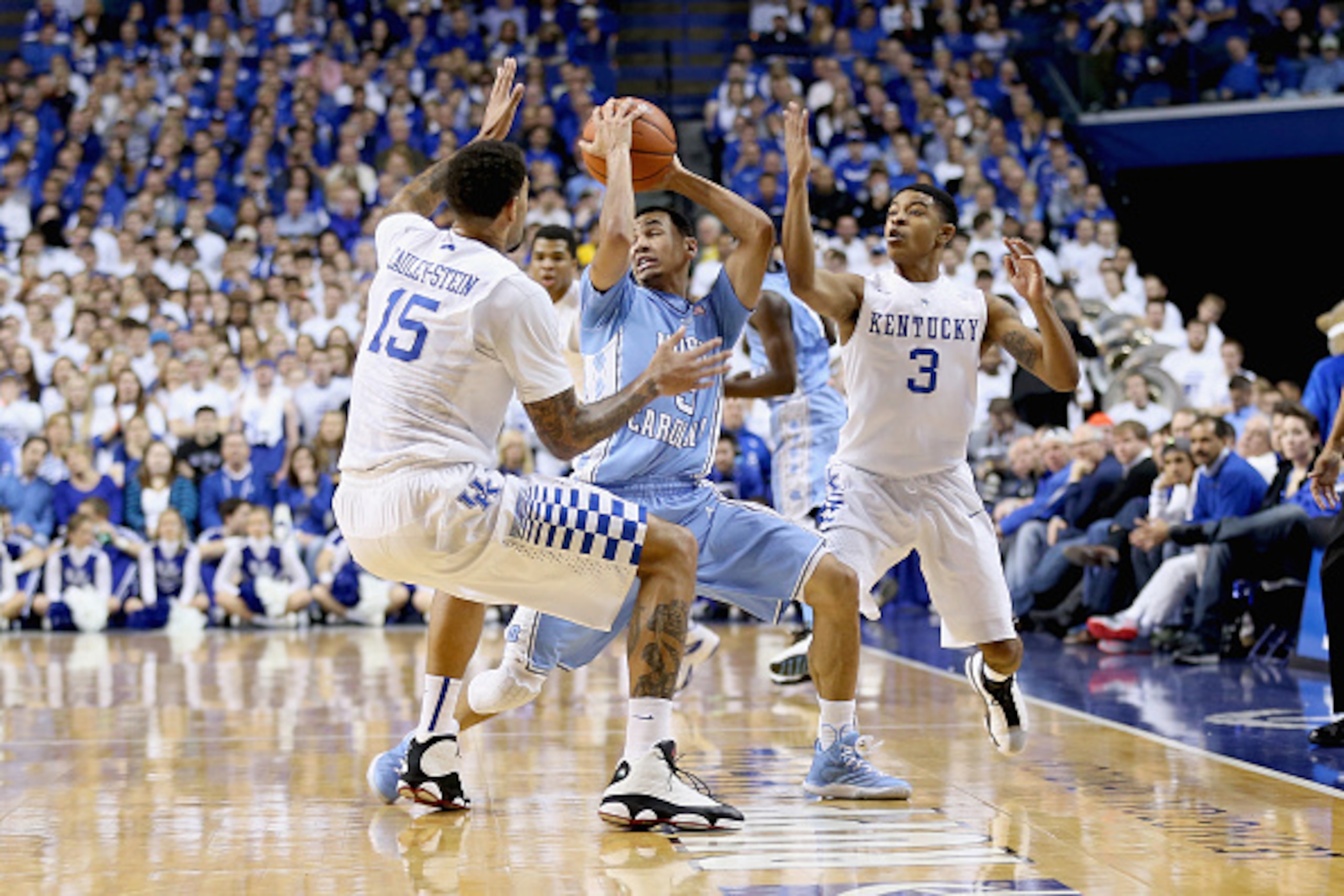 LEXINGTON, KY - DECEMBER 13:  Willie Cauley-Stein #15 and Tyler Ulis #3 of the Kentucky Wildcats defend Marcus Paige #5 of the  North Carolina Tar Heels during the game at Rupp Arena on December 13, 2014 in Lexington, Kentucky.  (Photo by Andy Lyons/Getty