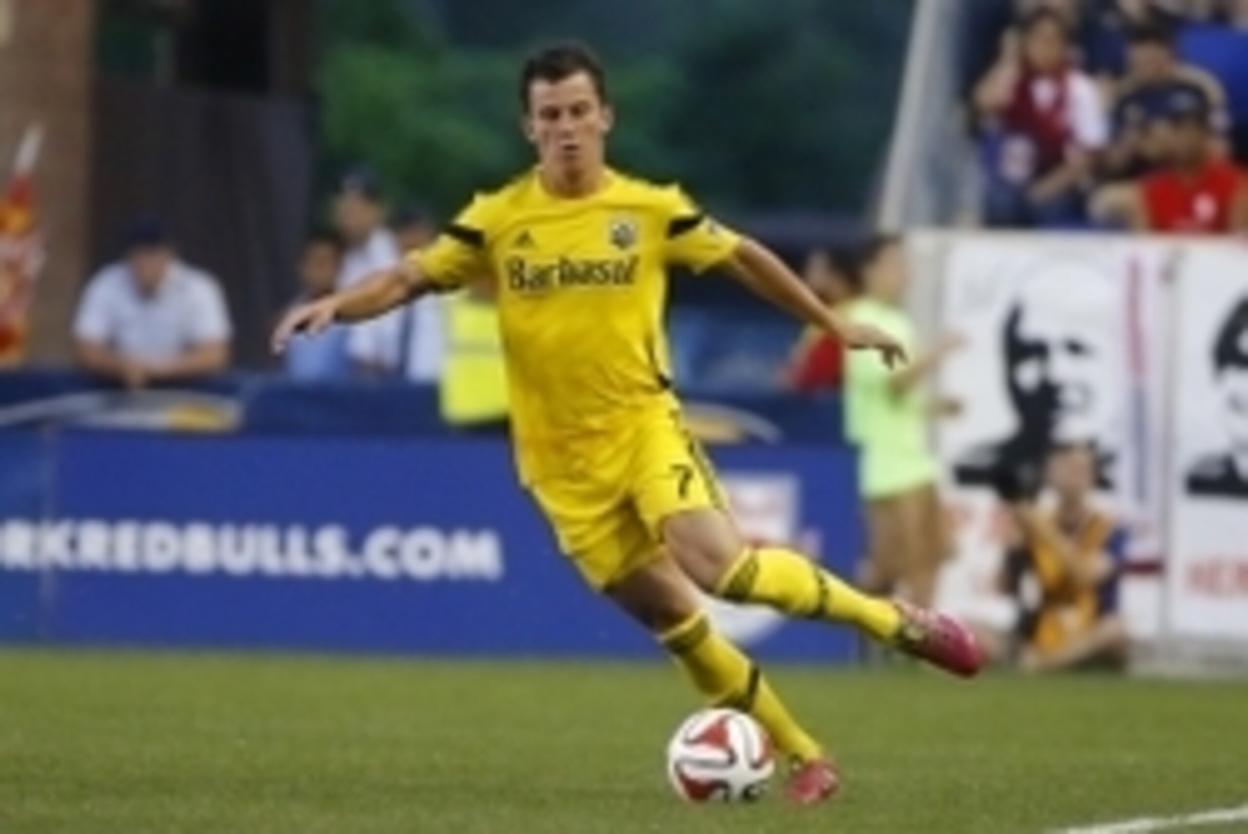 Jul 12, 2014; Harrison, NJ, USA;  Columbus Crew midfielder Bernardo Anor (7) brings the ball up field during the second half against the New York Red Bulls at Red Bull Arena. New York Red Bulls defeat the Columbus Crew 4-1. Mandatory Credit: Jim O'Connor-