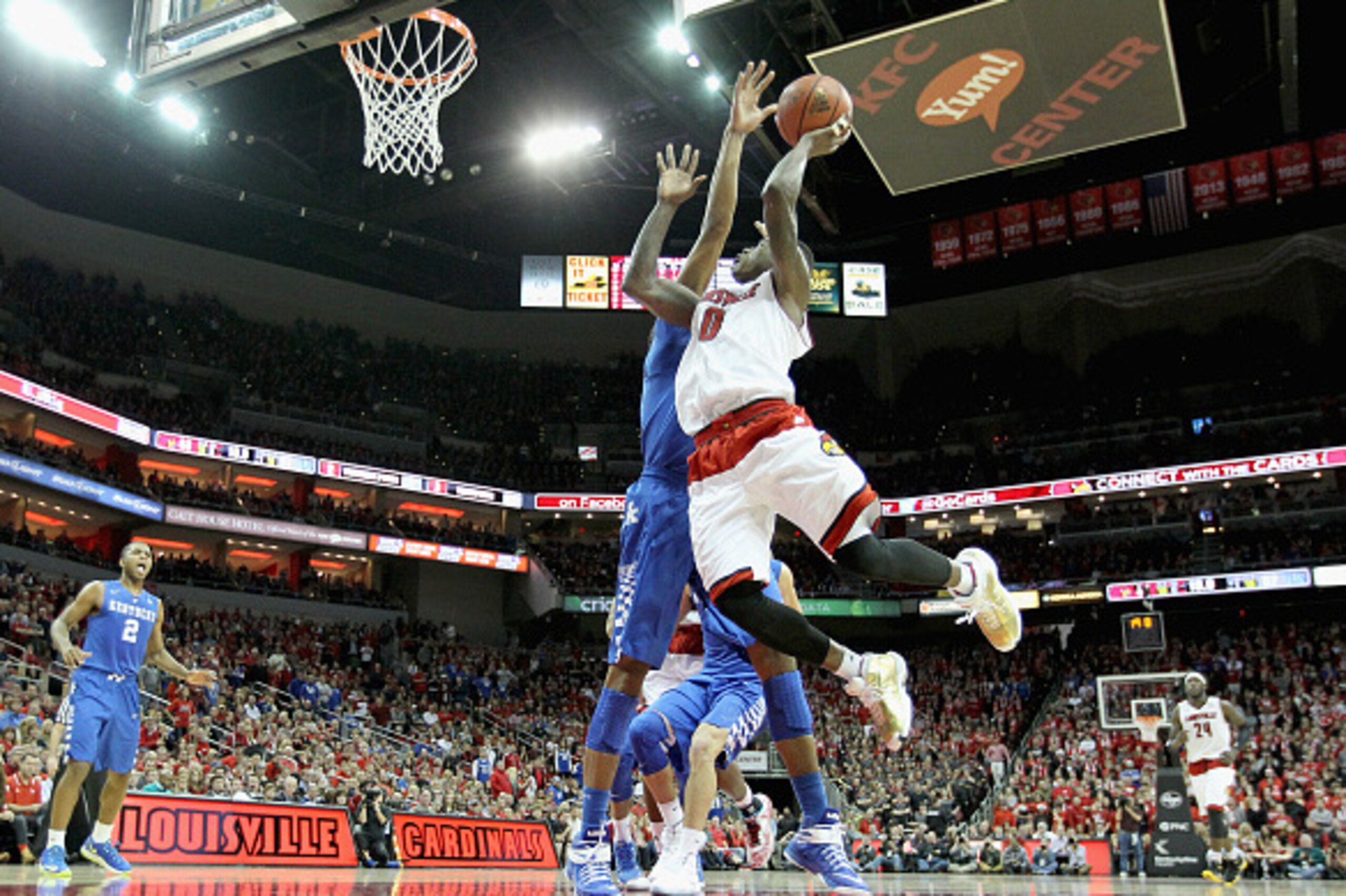 LOUISVILLE, KY - DECEMBER 27: Terry Rozier #0 of the Louisville Cardinals shoots the ball during the game against the  Kentucky Wildcats at KFC YUM! Center on December 27, 2014 in Louisville, Kentucky.  (Photo by Andy Lyons/Getty Images)