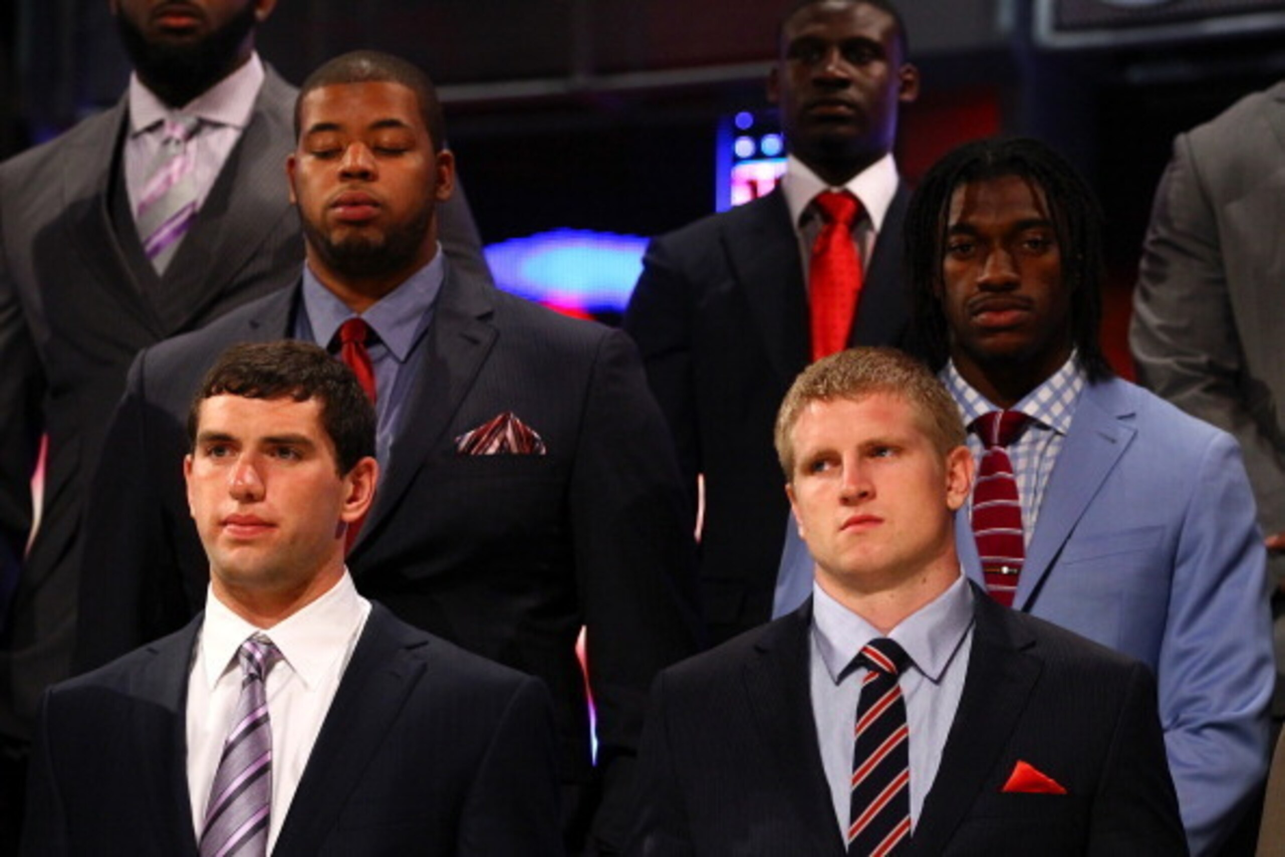 NEW YORK, NY - APRIL 26:  Andrew Luck (L) of Stanford (#1 overall pick by the Indianapolis Colts) and Robert Griffin III (R) of Baylor (#2 overall pick by the Washington Redskins) look on as they 2012 NFL draft class is intrduced during the 2012 NFL Draft