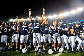 NEW YORK, NY - DECEMBER 27:  The Penn State Nittany Lions sing their alma mater after defeating the Boston College Eagles in the 2014 New Era Pinstripe Bowl at Yankee Stadium on December 27, 2014 in the Bronx borough of New York City.  (Photo by Alex Good
