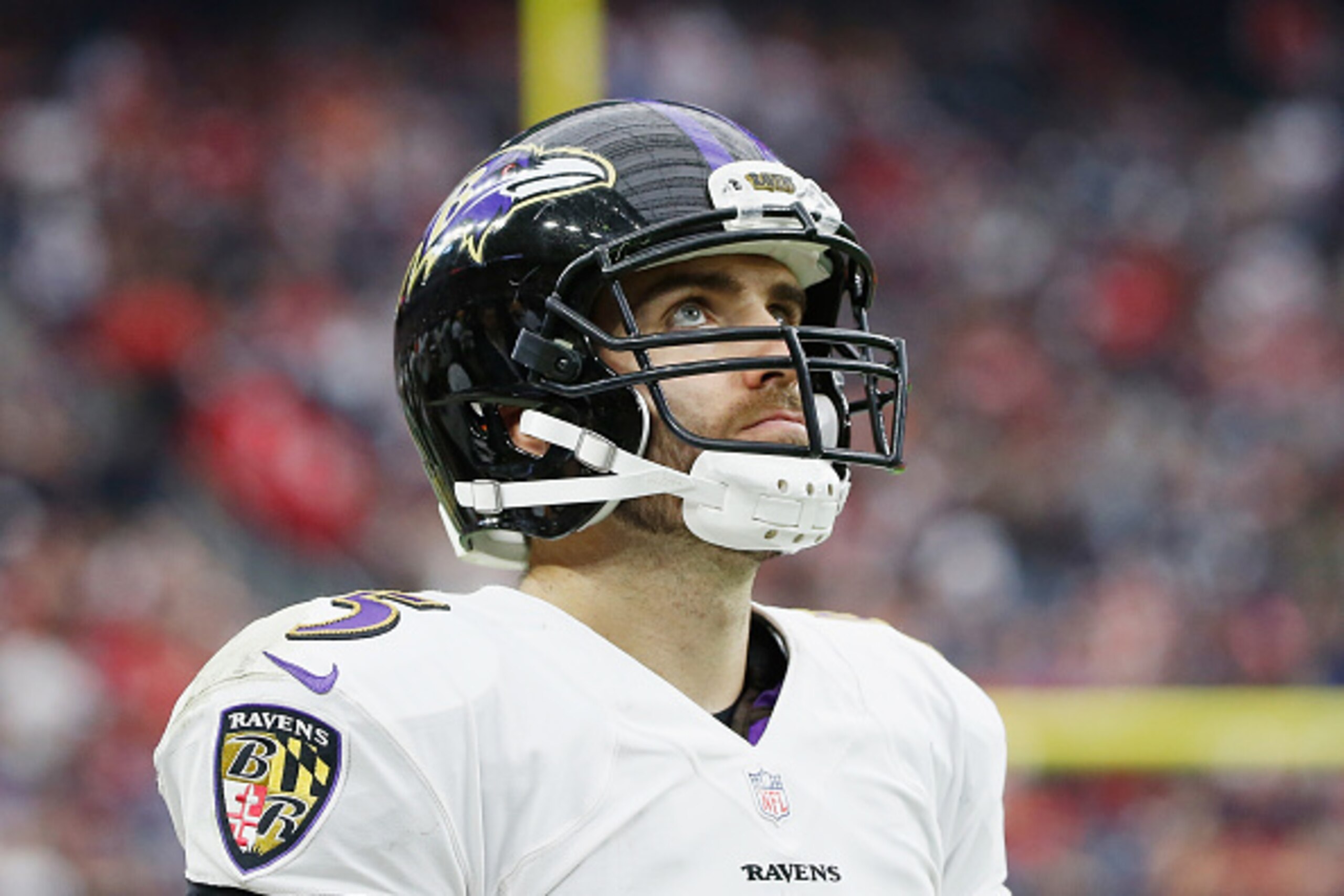 HOUSTON, TX - DECEMBER 21:  Joe Flacco #5 of the Baltimore Ravens waits near the bench during their game against the Houston Texans at NRG Stadium on December 21, 2014 in Houston, Texas.  (Photo by Scott Halleran/Getty Images)