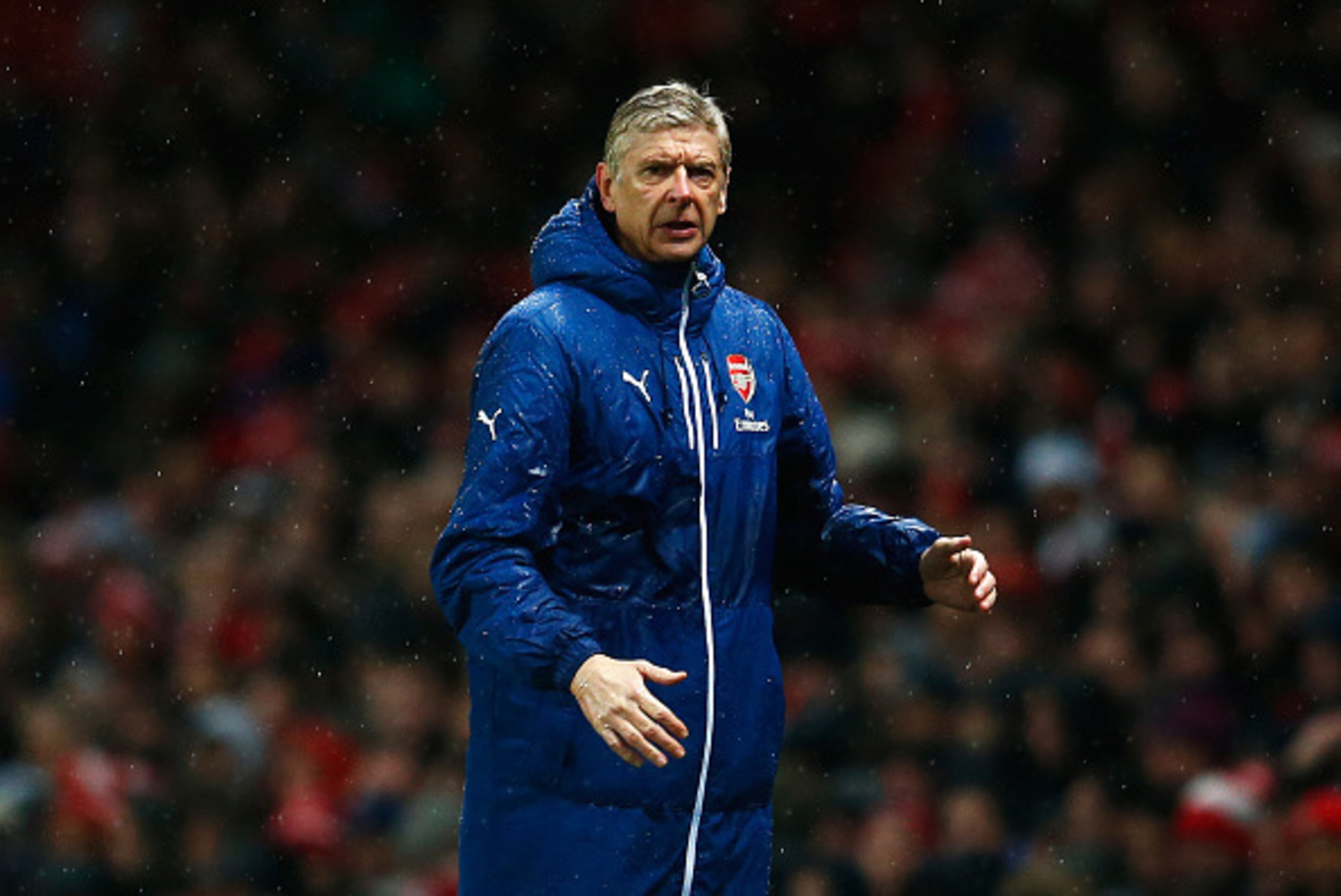 LONDON, ENGLAND - DECEMBER 26: Arsene Wenger, manager of Arsenal reacts during the Barclays Premier League match between Arsenal and Queens Park Rangers at Emirates Stadium on December 26, 2014 in London, England.  (Photo by Julian Finney/Getty Images)