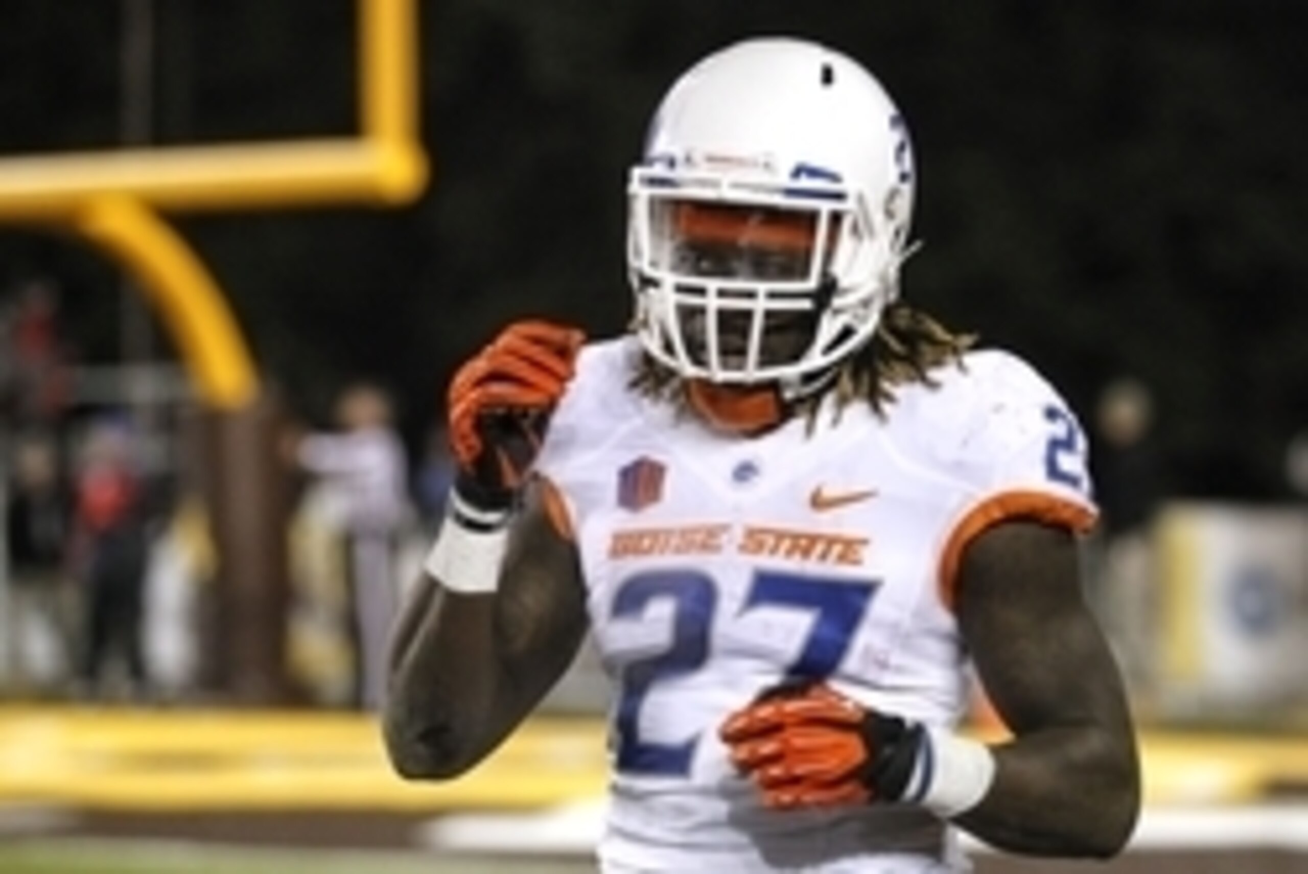 Nov 22, 2014; Laramie, WY, USA; Boise State Broncos running back Jay Ajayi (27) celebrates a touchdown against the Wyoming Cowboys during the second quarter at War Memorial Stadium. Mandatory Credit: Troy Babbitt-USA TODAY Sports