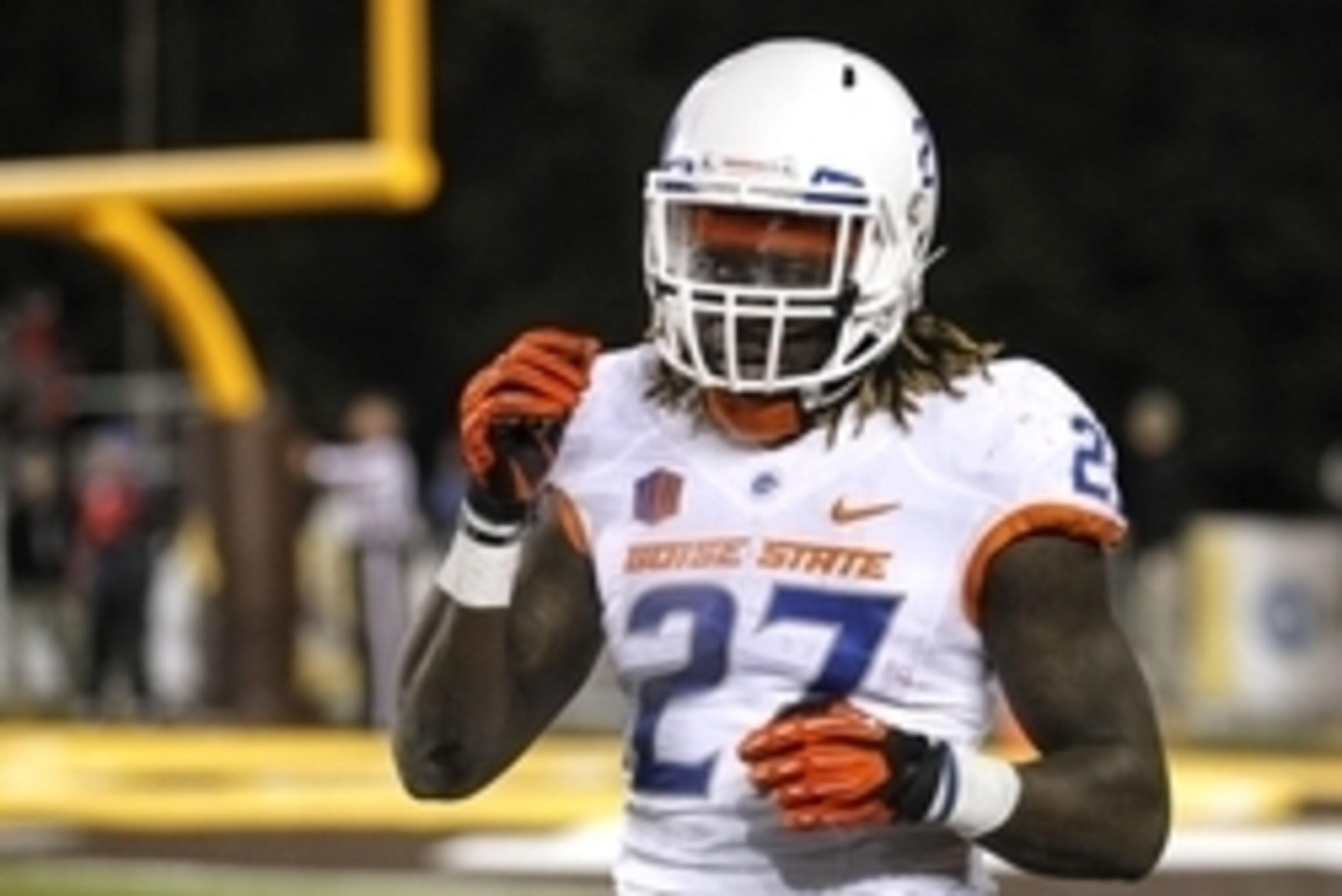Nov 22, 2014; Laramie, WY, USA; Boise State Broncos running back Jay Ajayi (27) celebrates a touchdown against the Wyoming Cowboys during the second quarter at War Memorial Stadium. Mandatory Credit: Troy Babbitt-USA TODAY Sports