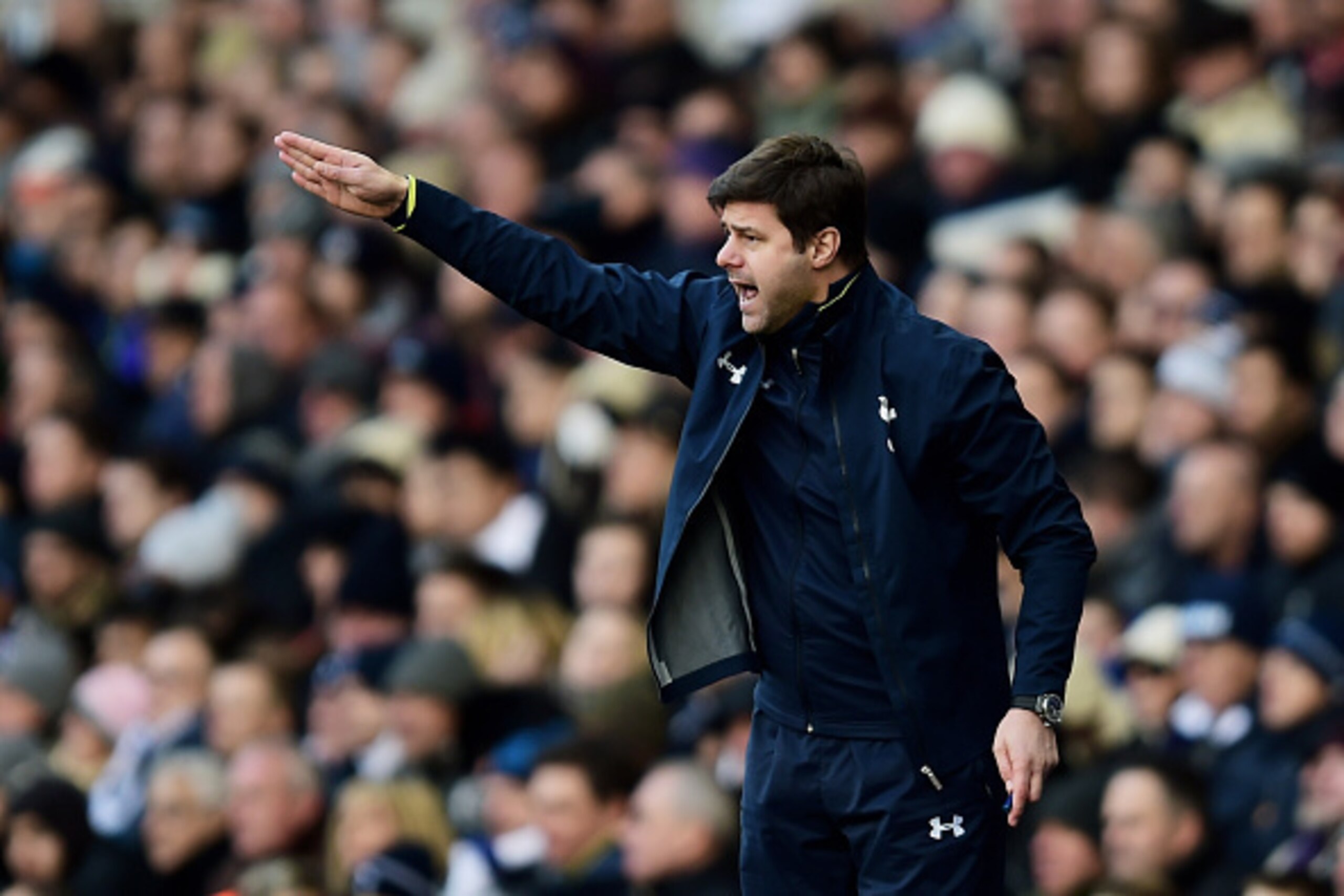 LONDON, ENGLAND - DECEMBER 28:  Manager Mauricio Pochettino of Spurs directs his players during the Barclays Premier League match between Tottenham Hotspur and Manchester United at White Hart Lane on December 28, 2014 in London, England.  (Photo by Jamie 