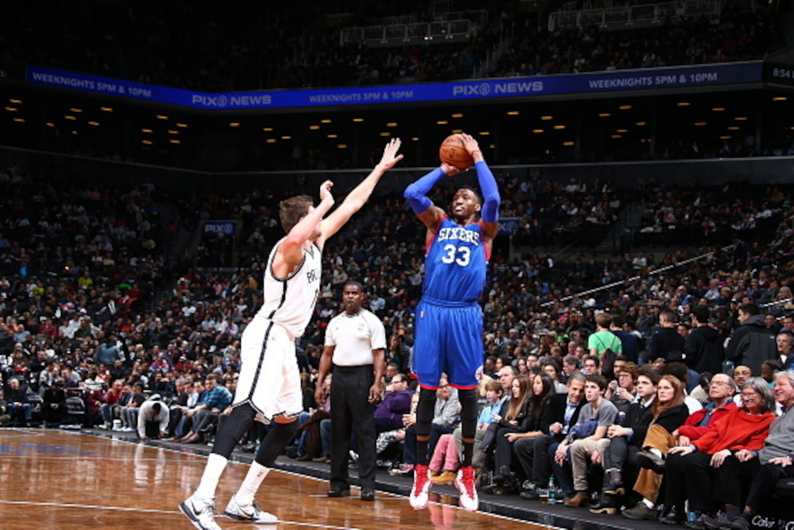 BROOKLYN, NY - DECEMBER 12:  Robert Covington #33 of the Philadelphia 76ers shoots the ball against the Brooklyn Nets during the game on December 12, 2014 at Barclays Center in Brooklyn, New York. NOTE TO USER: User expressly acknowledges and agrees that,
