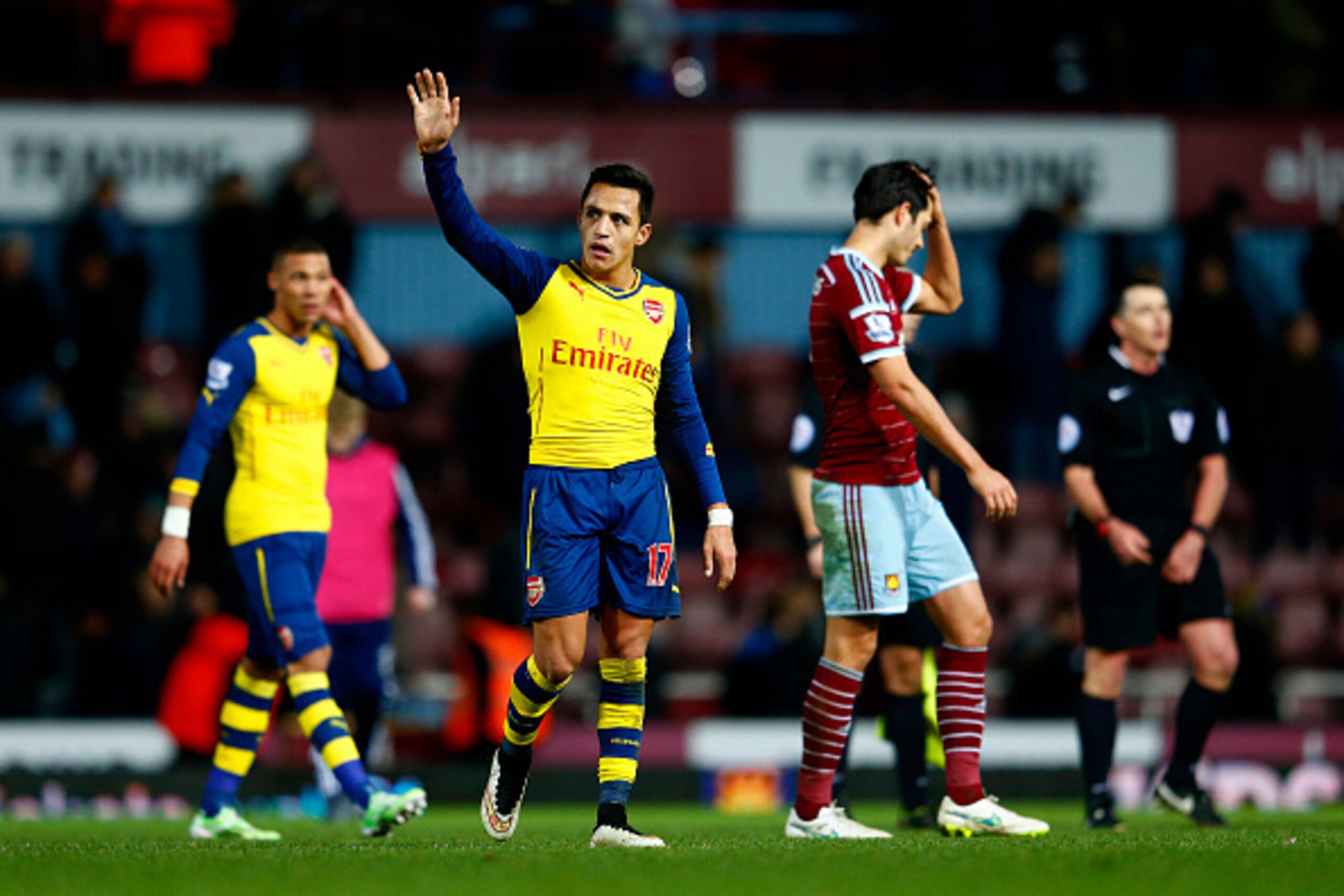 LONDON, ENGLAND - DECEMBER 28:  Alexis Sanchez of Arsenal waves to the fans during the Barclays Premier League match between West Ham United and Arsenal at Boleyn Ground on December 28, 2014 in London, England.  (Photo by Julian Finney/Getty Images)