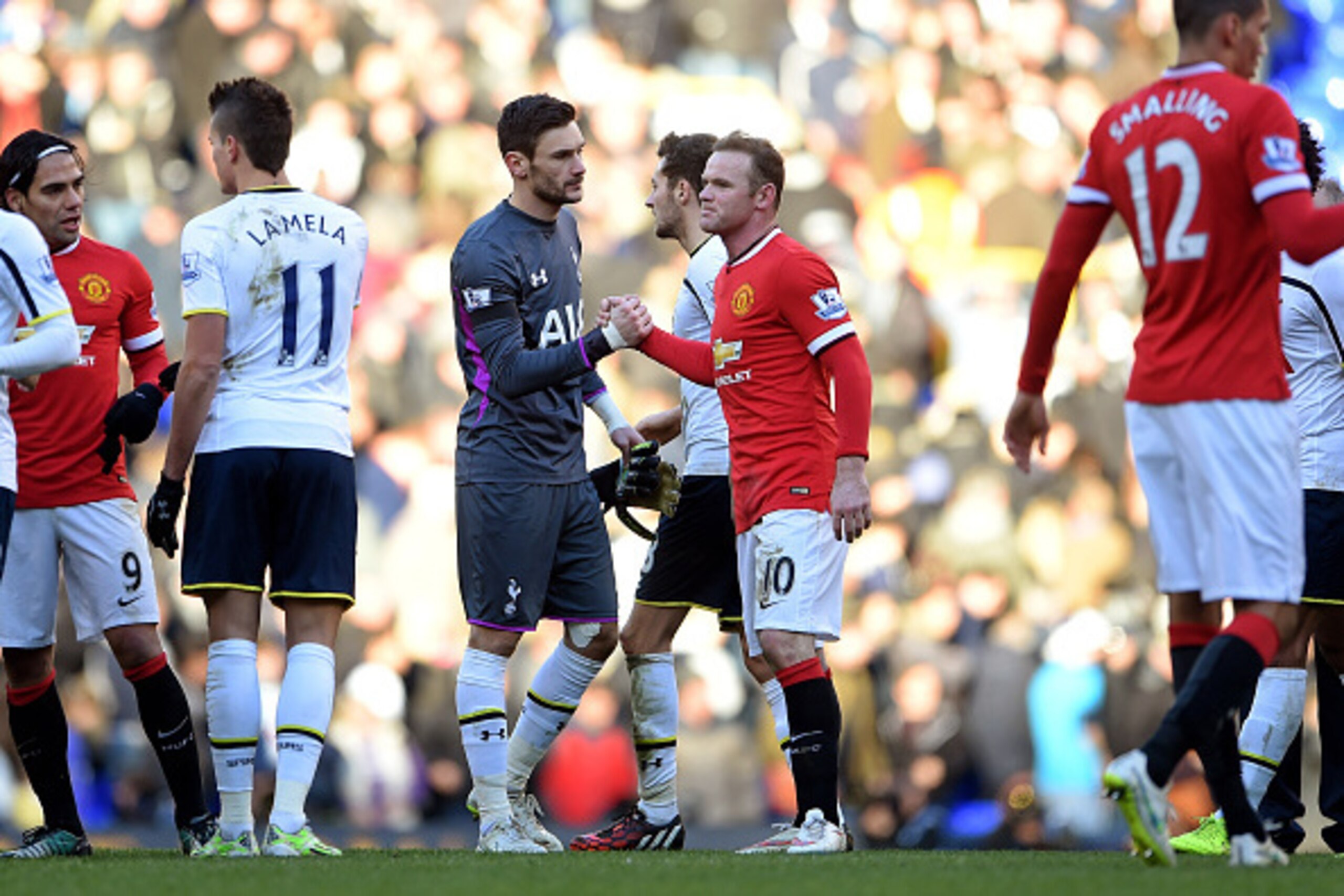 LONDON, ENGLAND - DECEMBER 28:  Opposing captains Hugo Lloris of Spurs and Wayne Rooney of Manchester United shake hands following the 0-0 draw during the Barclays Premier League match between Tottenham Hotspur and Manchester United at White Hart Lane on 