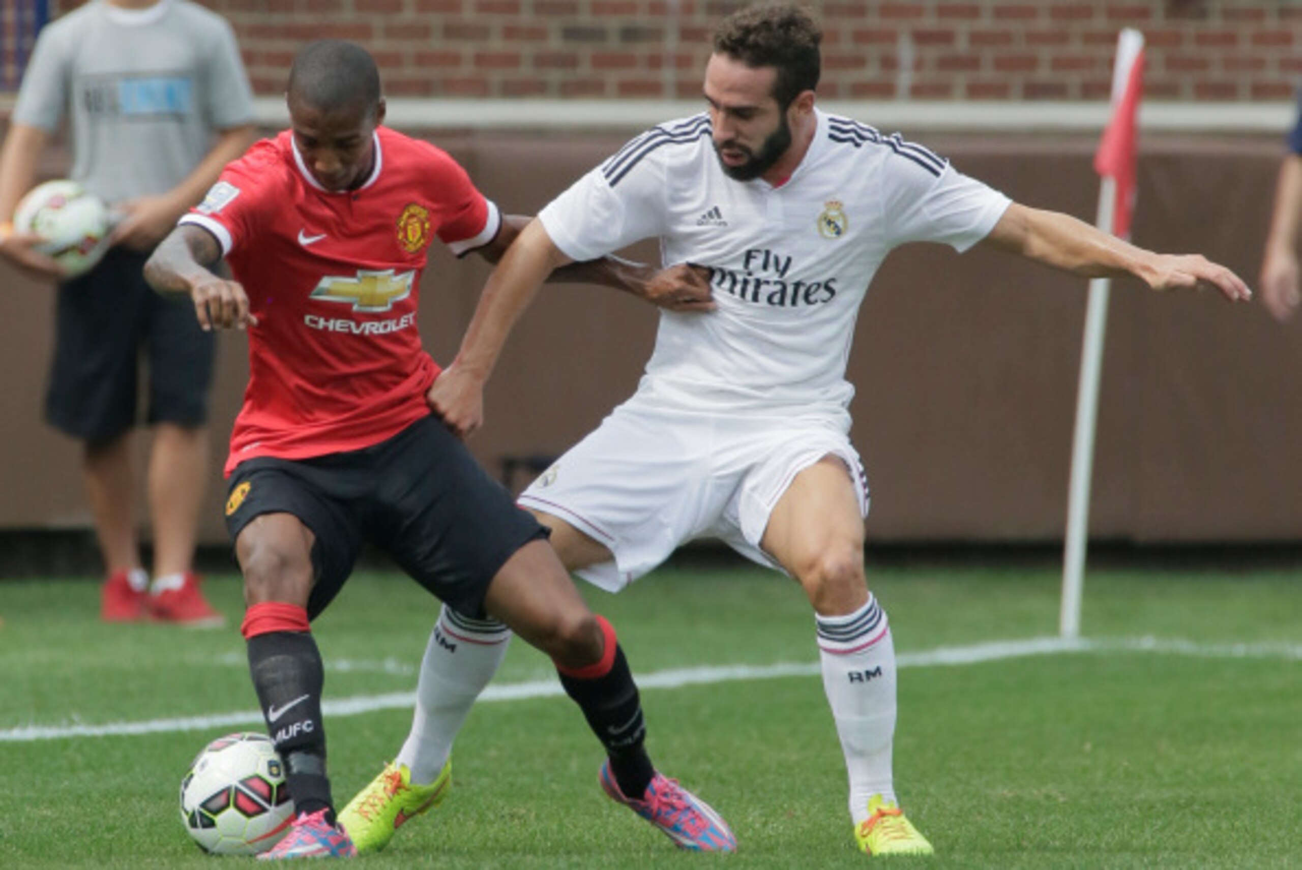 ANN ARBOR, MI - AUGUST 2: Dani Carvajal #15 of Real Madrid tries to steal the ball from Ashley Young #18 of Manchester United during the first half of the Guinness International Champions Cup at Michigan Stadium on August 2, 2014, in Ann Arbor, Mich (Phot