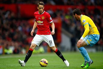 MANCHESTER, ENGLAND - NOVEMBER 08:  Adnan Januzaj of Manchester United competes with Joel Ward of Crystal Palace during the Barclays Premier League match between Manchester United and Crystal Palace at Old Trafford on November 8, 2014 in Manchester, Engla