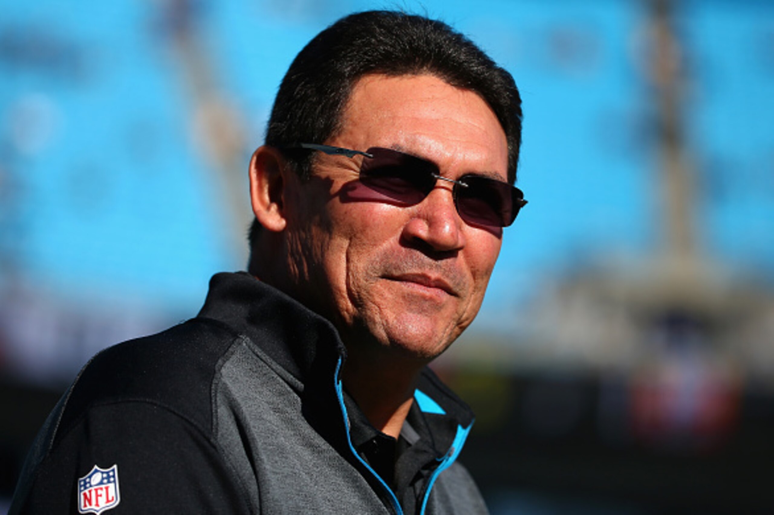 CHARLOTTE, NC - DECEMBER 14:  Carolina Panthers head coach Ron Rivera takes the field before the game against the Tampa Bay Buccaneers at Bank of America Stadium on December 14, 2014 in Charlotte, North Carolina.  (Photo by Streeter Lecka/Getty Images)