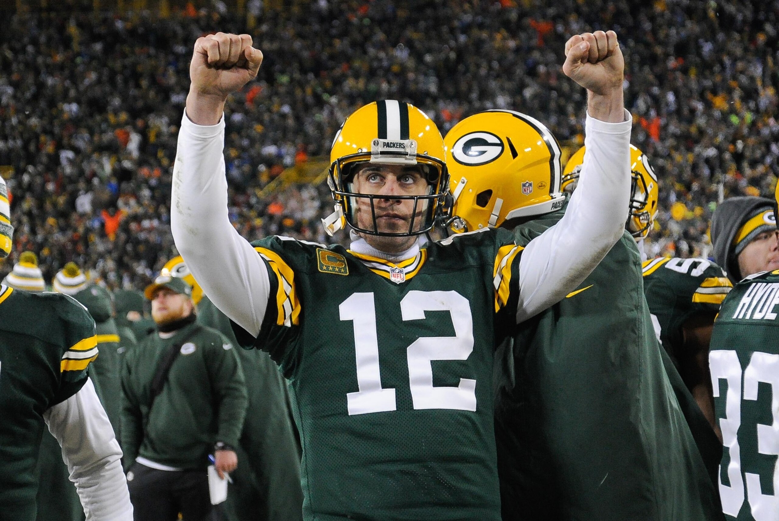Dec 28, 2014; Green Bay, WI, USA; Green Bay Packers quarterback Aaron Rodgers (12) reacts after officials ruled a 2-point conversion attempt by the Detroit Lions failed in the fourth quarter at Lambeau Field. Mandatory Credit: Benny Sieu-USA TODAY Sports