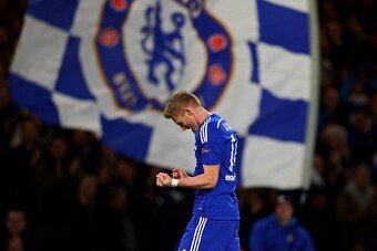 LONDON, ENGLAND - DECEMBER 10:  Andre Schuerrle of Chelsea celebrates after scoring his team's second goal during the UEFA Champions League group G match between Chelsea and Sporting Clube de Portugal at Stamford Bridge on December 10, 2014 in London, Uni