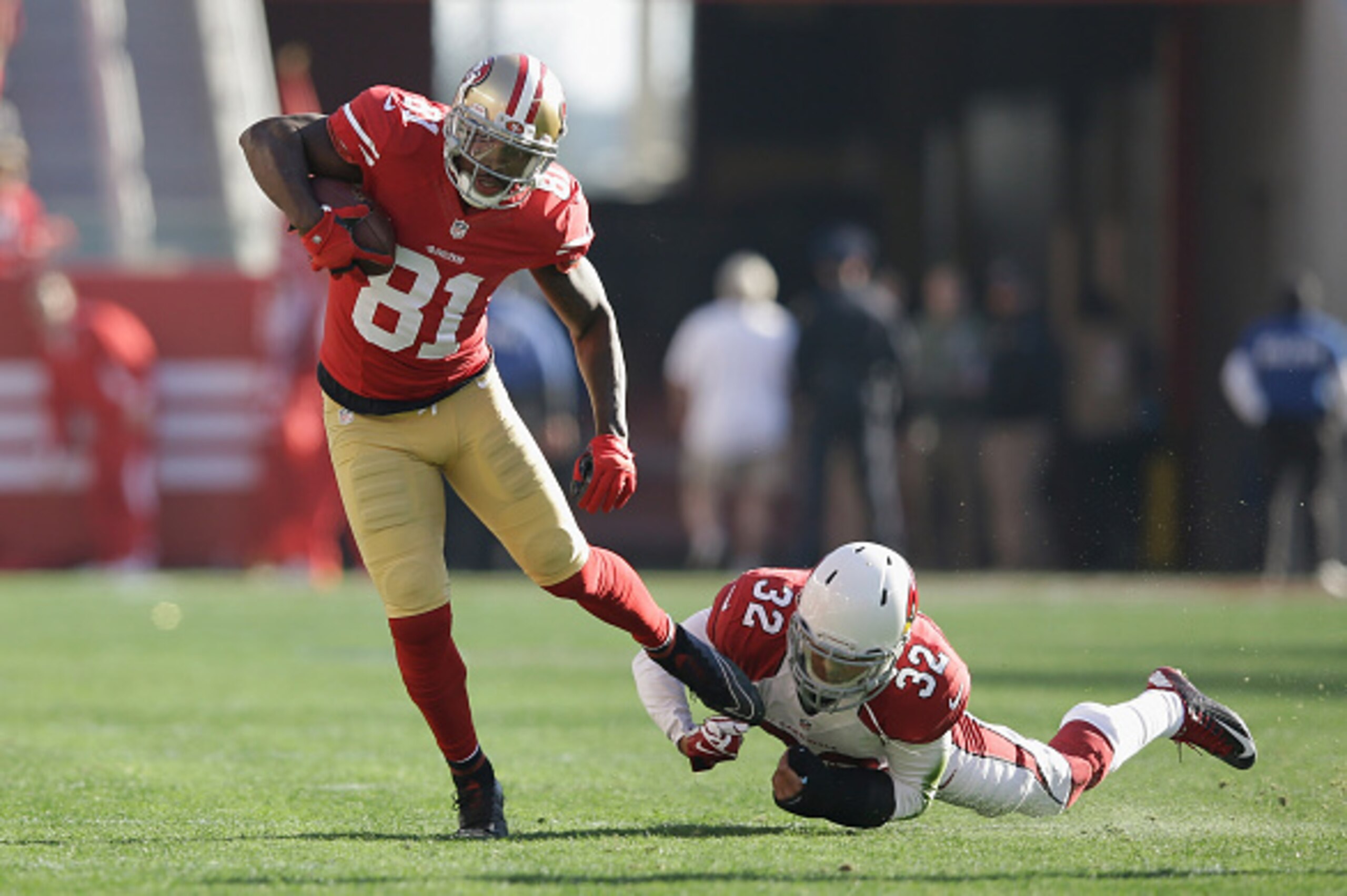 SANTA CLARA, CA - DECEMBER 28: Anquan Boldin #81 of the San Francisco 49ers avoids the tackle against Tyrann Mathieu #32 of the Arizona Cardinals in the first half  at Levi's Stadium on December 28, 2014 in Santa Clara, California.  (Photo by Ezra Shaw/Ge