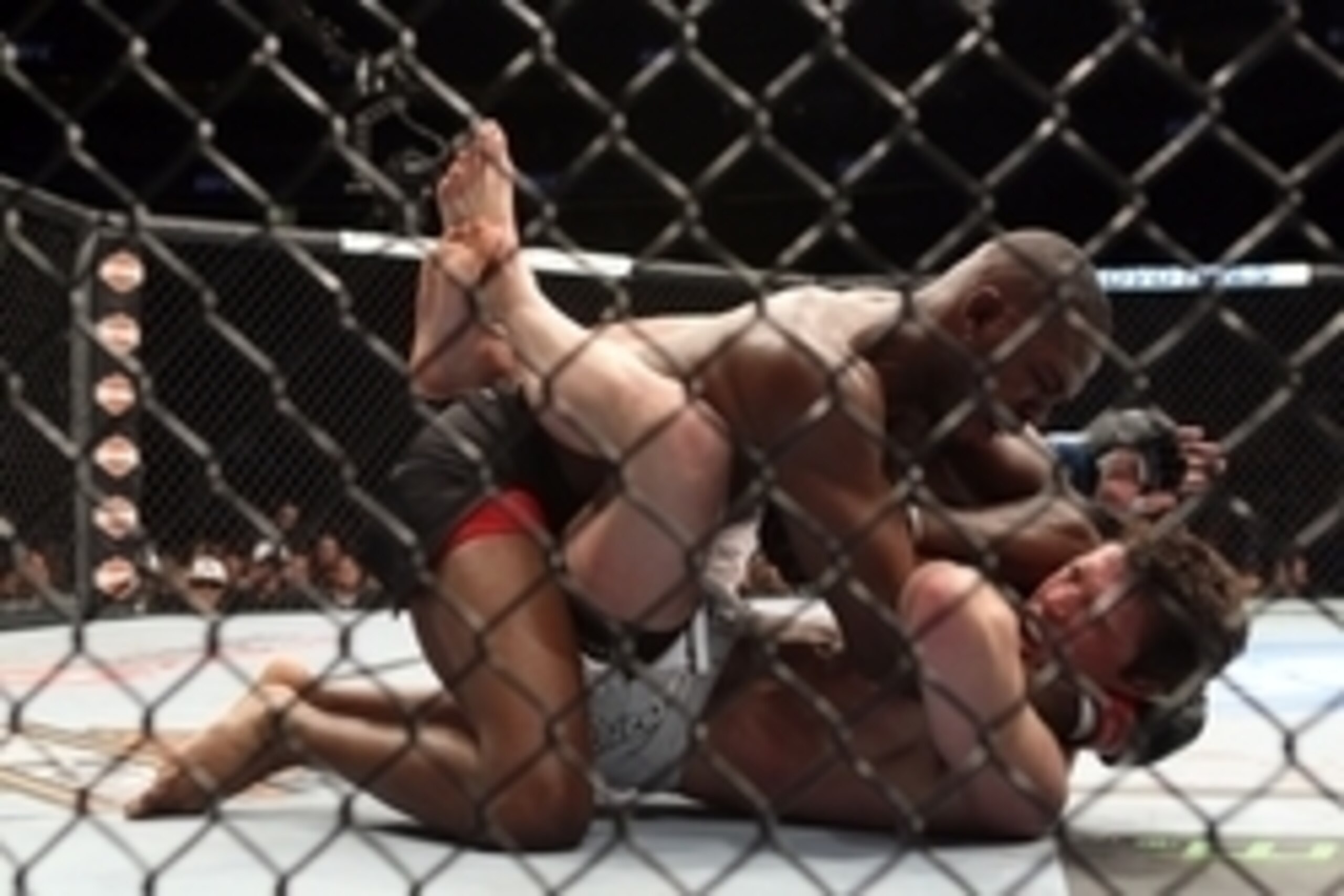 Apr 27, 2013; Newark, NJ, USA; Jon Jones (black shorts) competes against Chael Sonnen (white shorts)during UFC 159 at the Prudential Center. Mandatory Credit: Brad Penner-USA TODAY Sports Apr 27, 2013; Newark, NJ, USA; Jon Jones (black shorts) competes against Chael Sonnen (white shorts)during UFC 159 at the Prudential Center. Mandatory Credit: Brad Penner-USA TODAY Sports