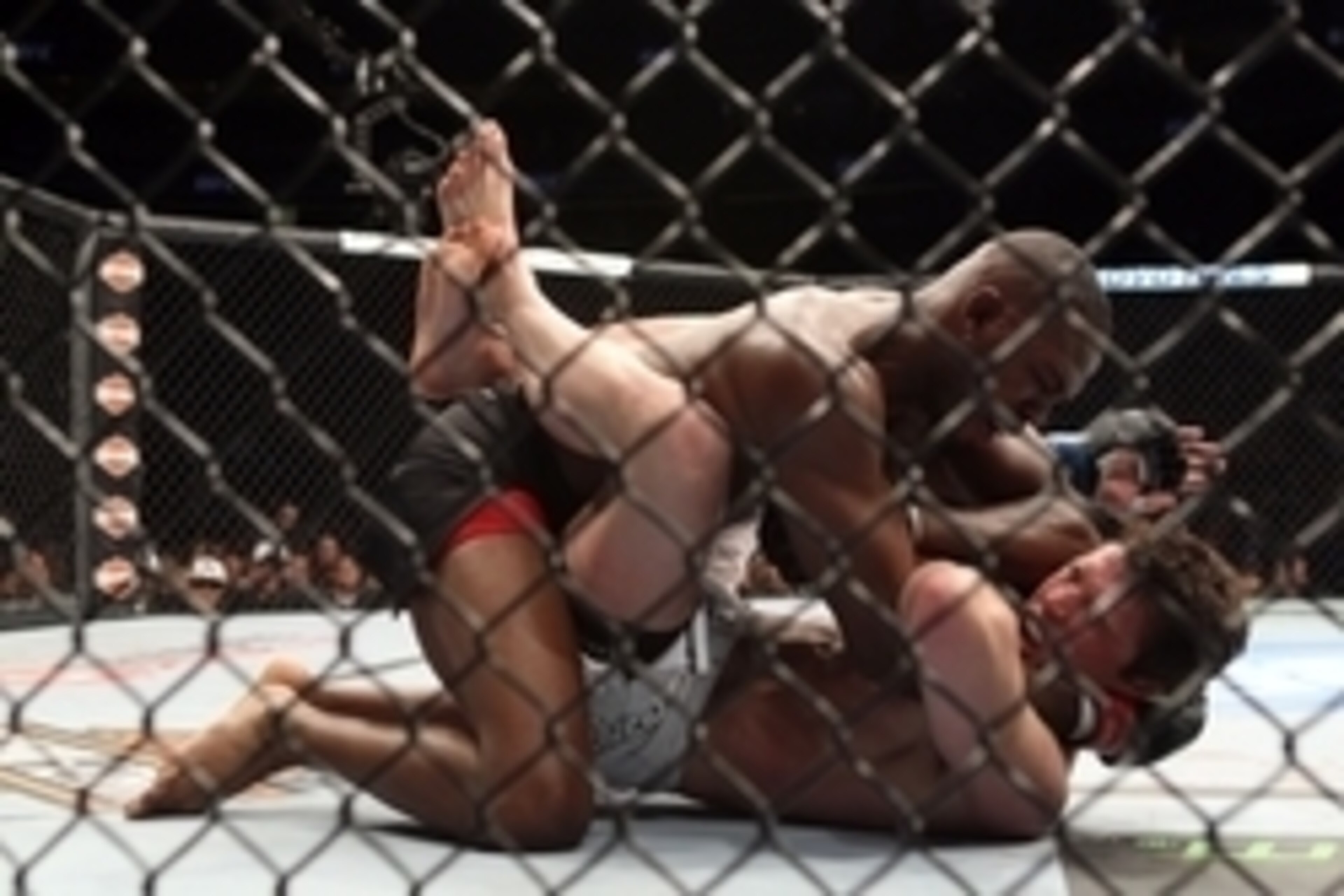Apr 27, 2013; Newark, NJ, USA; Jon Jones (black shorts) competes against Chael Sonnen (white shorts)during UFC 159 at the Prudential Center. Mandatory Credit: Brad Penner-USA TODAY Sports Apr 27, 2013; Newark, NJ, USA; Jon Jones (black shorts) competes against Chael Sonnen (white shorts)during UFC 159 at the Prudential Center. Mandatory Credit: Brad Penner-USA TODAY Sports