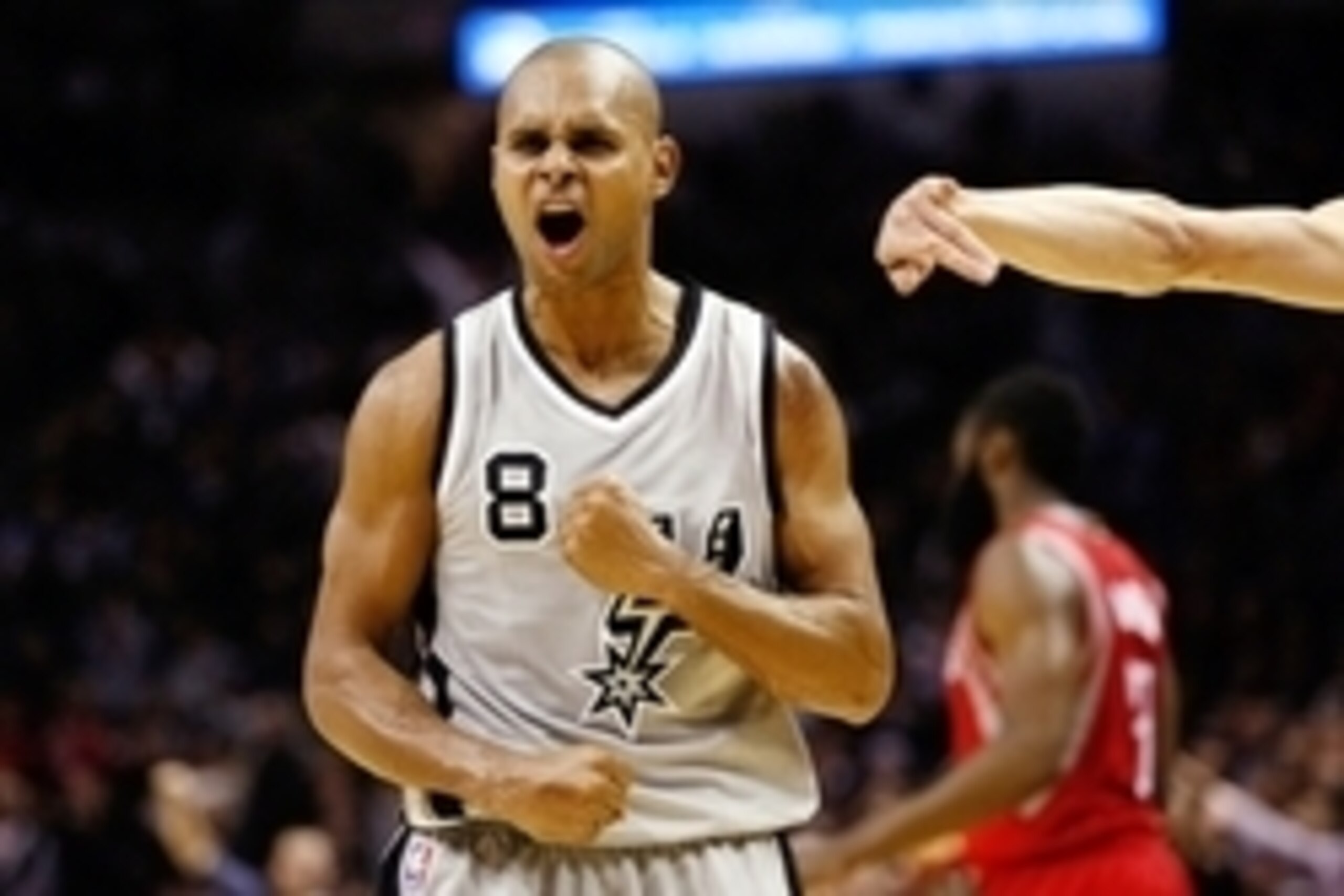 Dec 28, 2014; San Antonio, TX, USA; San Antonio Spurs point guard Patty Mills (8) reacts during the second half against the Houston Rockets at AT&T Center. The Spurs won 110-106. Mandatory Credit: Soobum Im-USA TODAY Sports