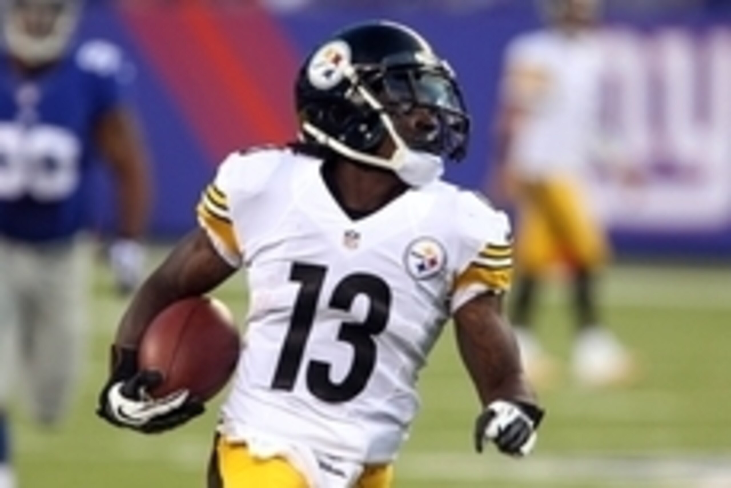 Aug 9, 2014; East Rutherford, NJ, USA;  Pittsburgh Steelers running back Dri Archer (13) rushes for a first down against the New York Giants during first quarter  at MetLife Stadium. Mandatory Credit: Noah K. Murray-USA TODAY Sports