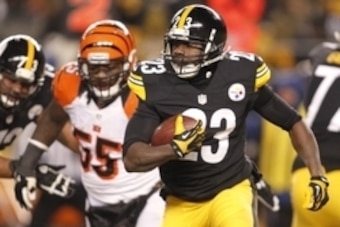 Dec 15, 2013; Pittsburgh, PA, USA; Pittsburgh Steelers running back Felix Jones (23) runs with the ball against the Cincinnati Bengals during the second quarter at Heinz Field. Mandatory Credit: Charles LeClaire-USA TODAY Sports