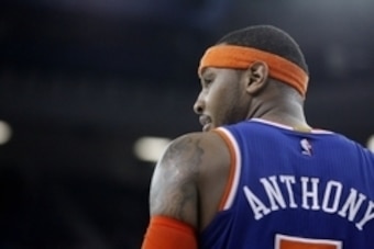Dec 27, 2014; Sacramento, CA, USA; New York Knicks forward Carmelo Anthony (7) looks on from the court against the Sacramento Kings in the fourth quarter at Sleep Train Arena. The Kings won 135-129 in overtime. Mandatory Credit: Cary Edmondson-USA TODAY S
